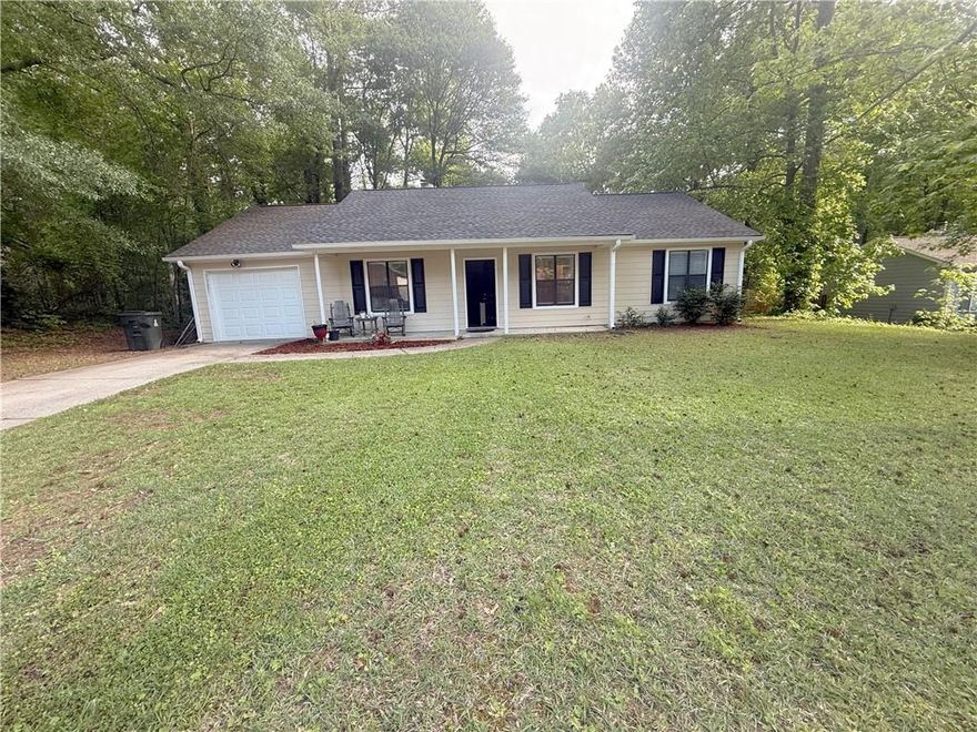 Looking for a  Beautiful and affordable Home? look no further , you have have found it!  As soon as you step inside you are greeted with large family room , nice brand new hard floors, the cozy fireplace, new paint , Nice kitchen with granite countertop  , eat in breakfast area . The house has been remodeled to provide comfort and convenience for the new owners. Also the great spacious back yard is perfect for family reunions . Great location in Marietta area. Very quiet neighborhood .