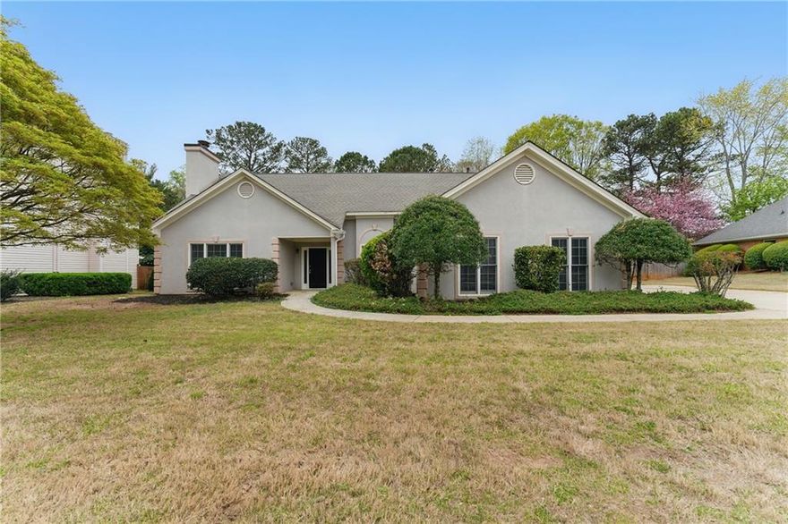 Welcome to 11925 N Hickory Trce, a charming ranch-style home nestled in the desirable Alpharetta area. This inviting 3-bedroom, 2-bathroom residence offers the perfect blend of comfort and style.

As you approach, you'll be greeted by a large, well-manicured front yard that provides excellent curb appeal and a warm welcome. The long driveway offers ample parking space for residents and guests alike.

Step inside to discover a bright and airy interior, thanks to the abundance of natural light that floods the home. The open floor plan creates a seamless flow between living spaces, perfect for both everyday living and entertaining.

The heart of the home is the eat-in kitchen, featuring modern stainless steel appliances that will delight any home chef. Adjacent to the kitchen is a separate dining room, ideal for formal meals or holiday gatherings.

With three comfortable bedrooms, this home provides plenty of space for family or guests. The two well-appointed bathrooms ensure convenience and privacy for all.

One of the highlights of this property is the spacious backyard, a private oasis perfect for relaxation or outdoor activities. The large deck is an ideal spot for al fresco dining, summer barbecues, or simply enjoying the fresh air.

Located in the sought-after city of Alpharetta, this home offers the perfect balance of suburban tranquility and easy access to urban amenities. Don't miss this opportunity to make this lovely ranch your new home!