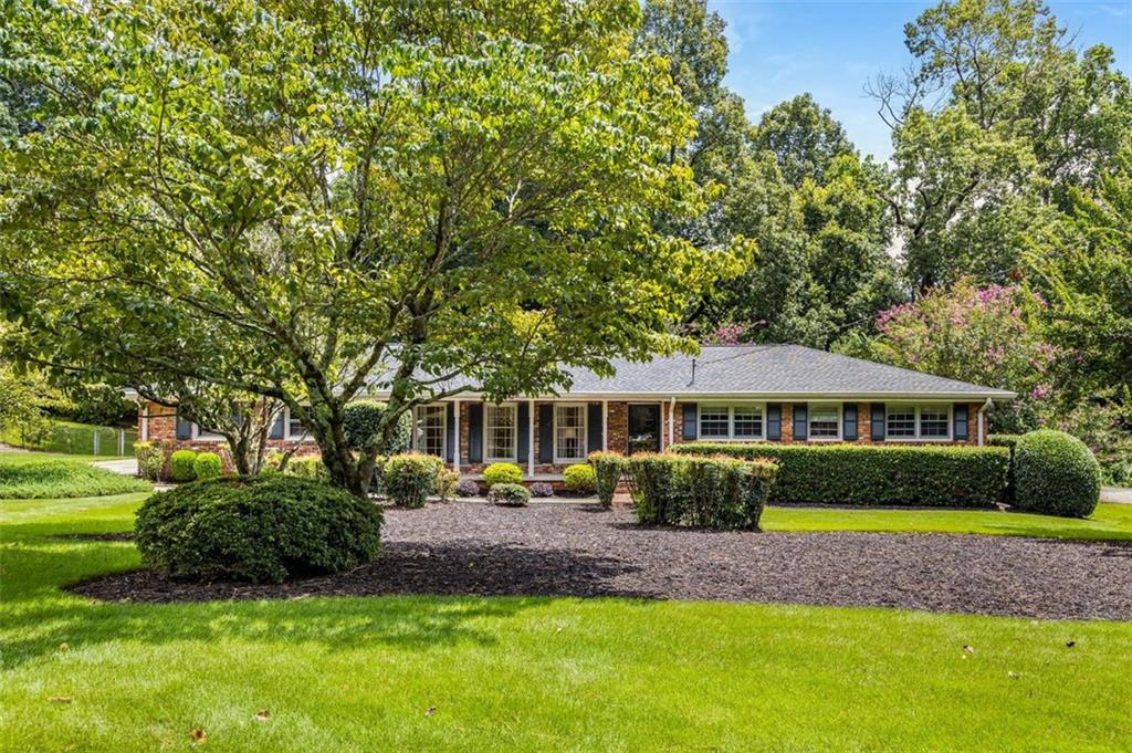 Tucked away in North Atlanta (DeKalb), this four-sided brick Mid-Century Modern Ranch/Rambler house is a place where timeless style and Modern Comfort connect. The moment you arrive, you can see and sense the Harmony and peace of this home. The professionally landscaped yard adds natural beauty. Inside, you will discover an atmosphere of warmth, beauty, and refinement. The remodeled kitchen is the heart of the home. It is wonderfully updated, yet it offers a clean and classic look including updated hardwood flooring, Modern Cabinets, farmhouse sink, and stainless appliances. Each of the three bedrooms offers a private sanctuary, and both full bathrooms have been tastefully updated to elevate everyday living. The fenced backyard is beautiful with lush grass that makes you want to take off your shoes and relax. You will feel grounded and uplifted. Perfect for your four-legged family member, too. With a spacious 2-car garage, proximity to great schools, and nearby access to parks, shopping, and dining, this home is more than a place to live. You will feel at home.
It's Turn-Key, Move-In-Ready! What are you waiting for? Call your movers. Your New Home is waiting for you!