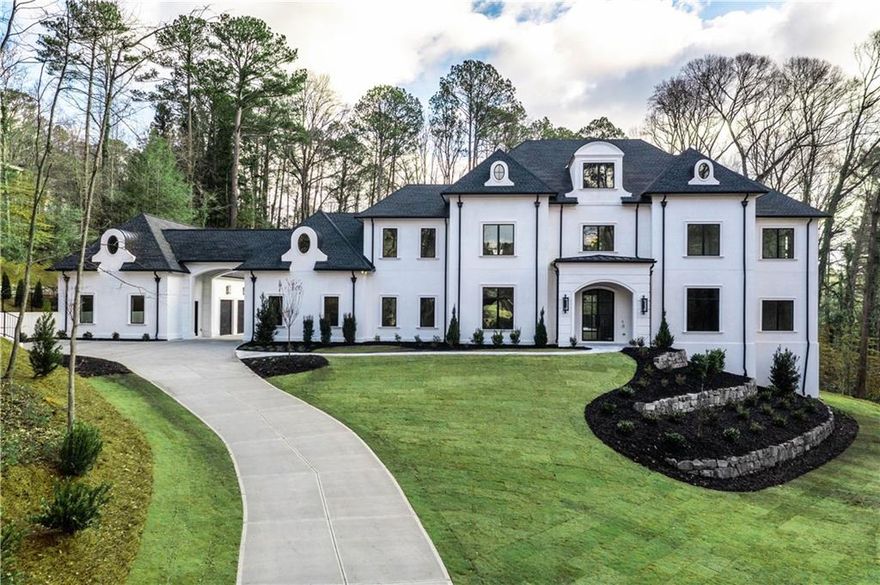 Extrodinary quality and craftsmanship by award winning builder, Loudermilk Custom Homes. Custom European Modern design situated on a wooded 2+ acre lot and featuring the finest designer selections, "smart" home technology and located in highly sought-after Chastain Park. Soaring three-story staircase and 12-foot ceilings on the main floor elevate the overall ambiance of this home. Additional features include 20-foot glass pocket doors, interior linear fireplace, 5-car garage, covered patio, and prep kitchen featuring a wine cooler, ice maker, and additional storage. Primary bedroom on main with private access to the laundry and two spacious closets and additional storage. Primary bedroom on main with private access to the laundry and two spacious closets. Secondary bedrooms upstairs with en-suite bathrooms and large flex room for future home amenities. The unfinished basement can accommodate an additional guest suite, home gym/sauna, office, media room and a future elevator to access all levels. This corner lot is the perfect location for entertaining with a walk out, first floor luxury pool and an outdoor cabana with a full bath. This luxury home is located within minutes of parks, schools, restaurants, and high-end shopping. Roane Loudermilk, for any inquiries.