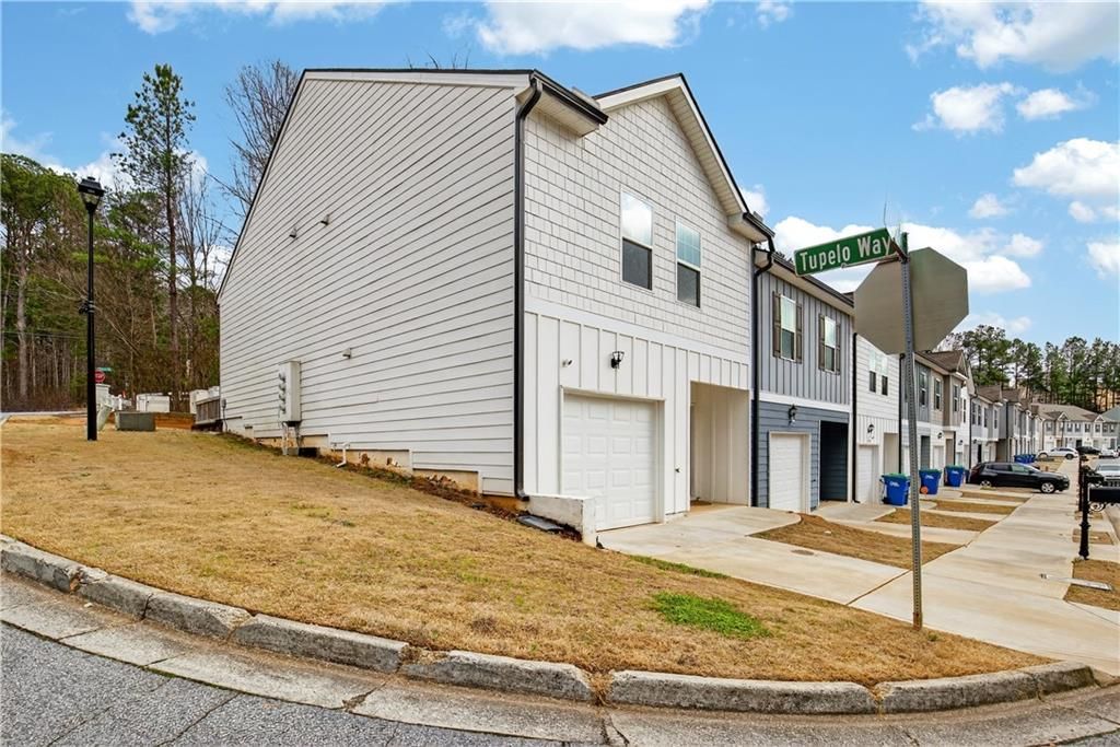 Photo of 4918 Lower Elm St, Atlanta, GA 30349 (MLS # 7729210)