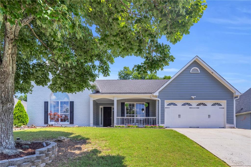 Welcome Home! A GREAT GREAT GREAT OPPORTUNITY in SUWANEE! Discover the vibrant lifestyle of Suwanee—where charming boutiques, acclaimed dining, lively festivals, and scenic parks await just minutes from your doorstep. Beautifully maintained 3-bedroom, 2-bath ranch-style home. Zoned for top-notch North Gwinnett schools, this move-in ready gem offers a spacious layout with incredible natural light and classic charm. The open-concept design includes a white kitchen with solid surface counters, a breakfast bar, pantry, and keeping room. Hardwood floors flow into a bright and airy living area with vaulted ceilings and a cozy gas fireplace. The oversized primary suite features a double vanity, soaking tub, separate shower, and walk-in closet—your own personal retreat! Three additional bedrooms provide flexibility for family, guests, or a home office. Located in a SAFE swim/tennis community with a neighborhood lake and just minutes from parks, schools, shopping, and dining, this home checks ALL the boxes. New paint, smart indoor & outdoor light features, newly renovated bathrooms. FULLY MAINTAINED, LOVED, AND READY FOR NEW OWNERS. STOP HERE—THIS IS THE ONE YOU’VE BEEN WAITING FOR!