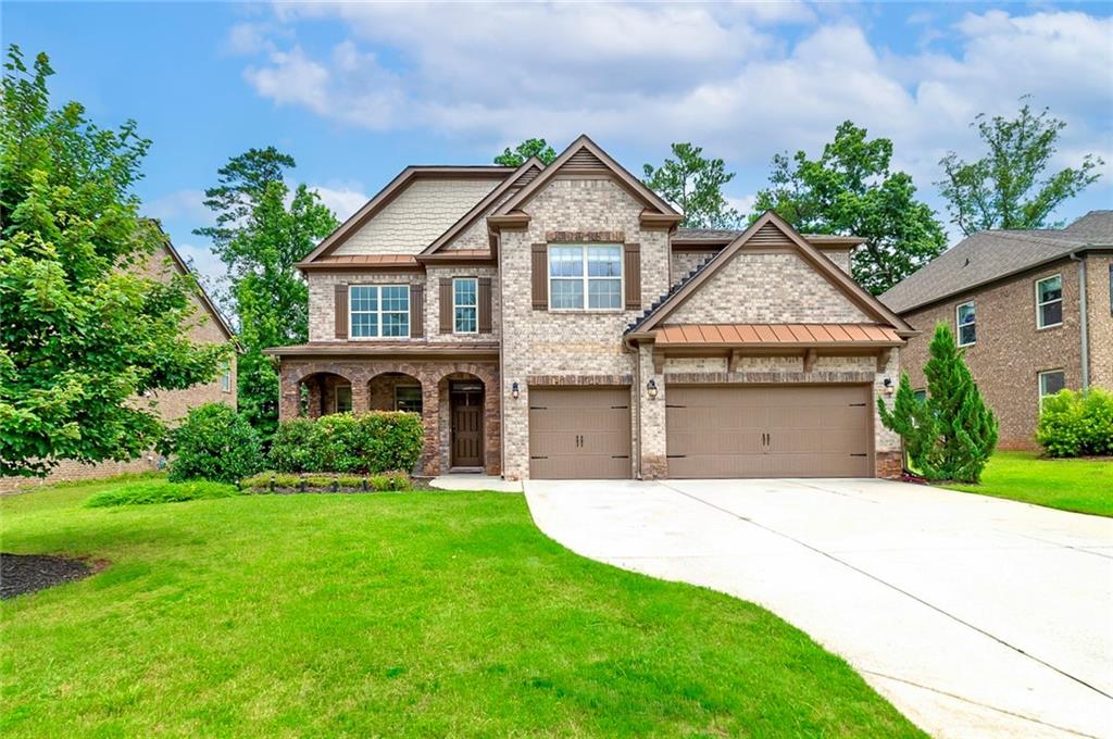 LAMBERT HIGH SCHOOL!! Elegant and spacious 5-bedroom, 4-bath residence nestled in one of Suwanee’s most sought-after communities. This impressive two-story home features a stately 3-sides brick exterior and a thoughtfully designed layout perfect for both everyday living and refined entertaining. Step inside to find rich hardwood floors flowing throughout most of the main level, complemented by brand new plush carpet in the inviting living room anchored by a cozy gas fireplace.
The gourmet kitchen has been tastefully upgraded with high-end finishes, offering ample cabinetry, granite countertops, and a large island ideal for gathering. A dramatic two-story ceiling elevates the formal dining room, setting the stage for memorable dinner parties and holiday celebrations. A private guest suite with en suite bath is conveniently located on the main level, providing comfort and privacy for visitors or multi-generational living.
Upstairs, you’ll find four generously sized bedrooms, including an expansive primary suite featuring a spa-inspired bath, large walk-in closet, and abundant natural light. The upper level also includes a spacious laundry room for added convenience. Located just minutes from premier shopping, dining, and top-rated schools, this home offers a rare blend of luxury, comfort, and convenience in an established and tranquil neighborhood.
