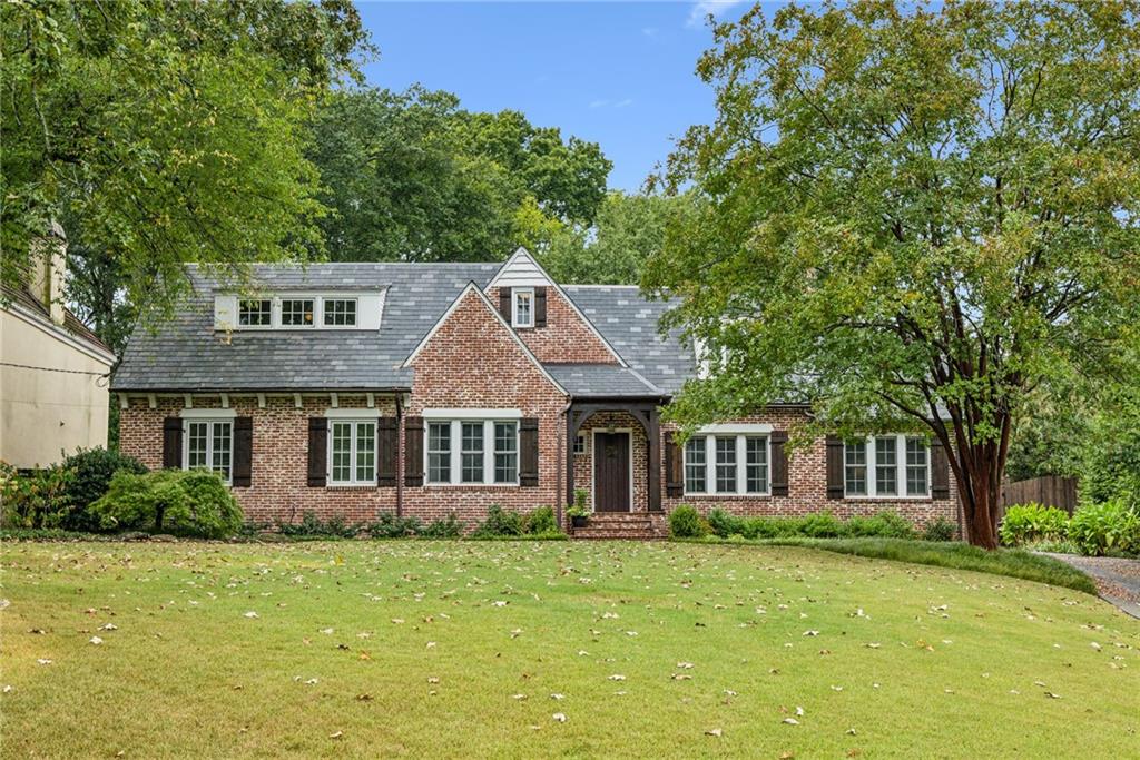 This charming home was fully renovated in 2008 and is EarthCraft Certified for energy efficiency. It won the 2010 Chrysalis whole House Remodel Award for remodeling excellance. The home is sited on a level .57 acre private fenced lot.  It features 9' ceilings, Geothermal heating and cooling, EcoStar 50 year roofing, double pane argon gas filled windows, and more. The spacious kitchen showcases imported Portuguese tile and pickled hardwood ceilings with an oversized wood topped island, and phantom screen doors. The Living room and office share a double sided gas fireplace. The master has double closets and a wonderful view of the back yard. The garage can house 4 cars and features a shop area and attic storage. this move in ready home is shown by appointment with the agent.