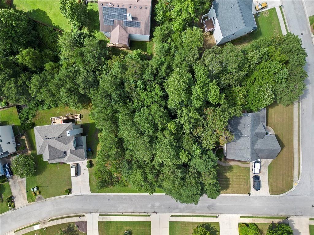 Ready to build? Well, we have the APPROVED PLANS and everything ready for you to start today on this fabulous corner lot. Come check out this generous site that will have the ability to hold a beautiful basement home in the fast growing area of Dallas, GA. Within close proximity of Paulding Hospital, Hiram, Cartersville, and Entertainment. This amazing lot is also walking distance of downtown Dallas, restaurants as well as convenient to shopping... what more can you ask for!! With low inventory throughout Atlanta and surrounding areas this is PERFECT time to build for yourself or someone else. Developers all the busy work has been done so that you can start working!!!! BRING ALL OFFERS TODAY!!!