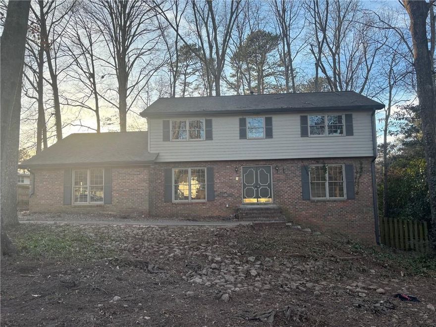 Your fixer upper in desirable Wheeler high school district awaits you!! Over 3900 sqft featuring 5 bedrooms and 3 full baths plus a full basement! Hardwood floors in almost every room of the home and super functional floor plan already! Bonus office room with fireplace on main!