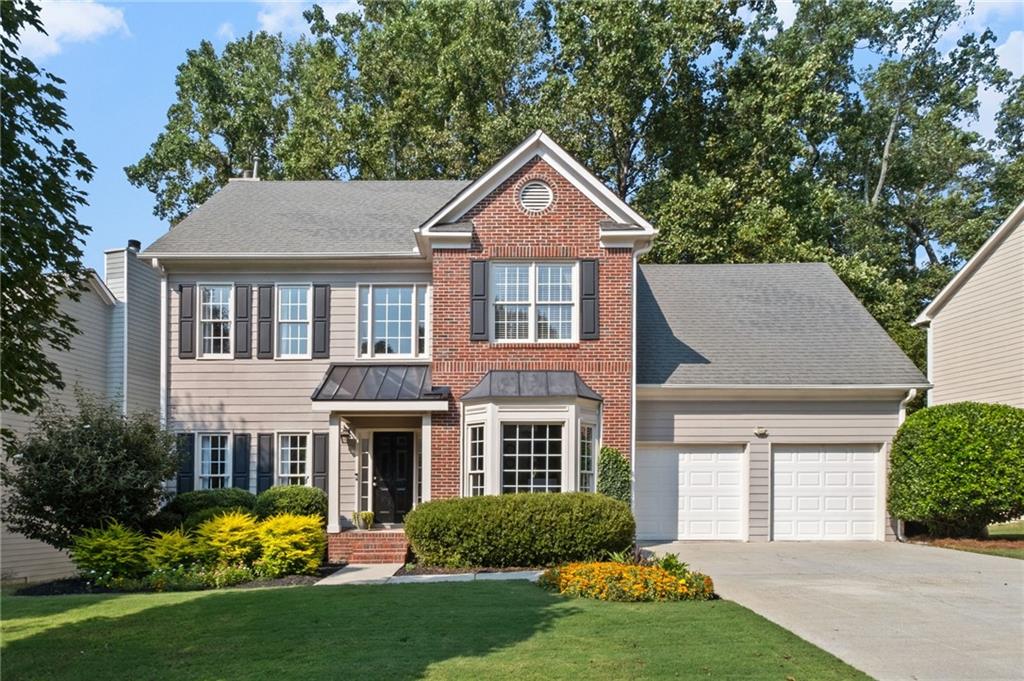 Welcome to this beautifully maintained and updated home tucked away in one of Smyrna’s most sought-after neighborhoods in the desirable King Springs school zone. From the moment you step inside, you’ll be greeted by gleaming hardwood floors, an open and airy floor plan, and stylish updates that make this home move-in ready.
The main level is designed for effortless living and entertaining with a spacious living room, a bright dining area, and a welcoming kitchen that flow seamlessly together. An updated powder room adds convenience, while the inviting living room is perfect for cozy evenings or lively gatherings.
Upstairs, retreat to the generous primary suite with an updated spa-like bathroom featuring sleek finishes and a calming design. Three additional bedrooms share a fully updated hall bath, providing flexible space for family, guests, or even a home office. Newer carpet adds value to this level.
Step outside to your own private oasis: a fabulous new covered back porch overlooking the beautifully landscaped yard with low-maintenance turf. The porch may become your favorite room in the house! Whether you’re enjoying morning coffee, watching football in the fall, or unwinding under the stars, this backyard is made for relaxing and entertaining. The owners transformed the space into a lush, family-friendly retreat.
Other updates include accent details inside, new windows, fresh siding and more! With a two-car garage, excellent storage, and proximity to The Battery Atlanta, Smyrna Market Village, the Silver Comet Trail, and top schools, this home delivers the perfect balance of comfort, style, and convenience.