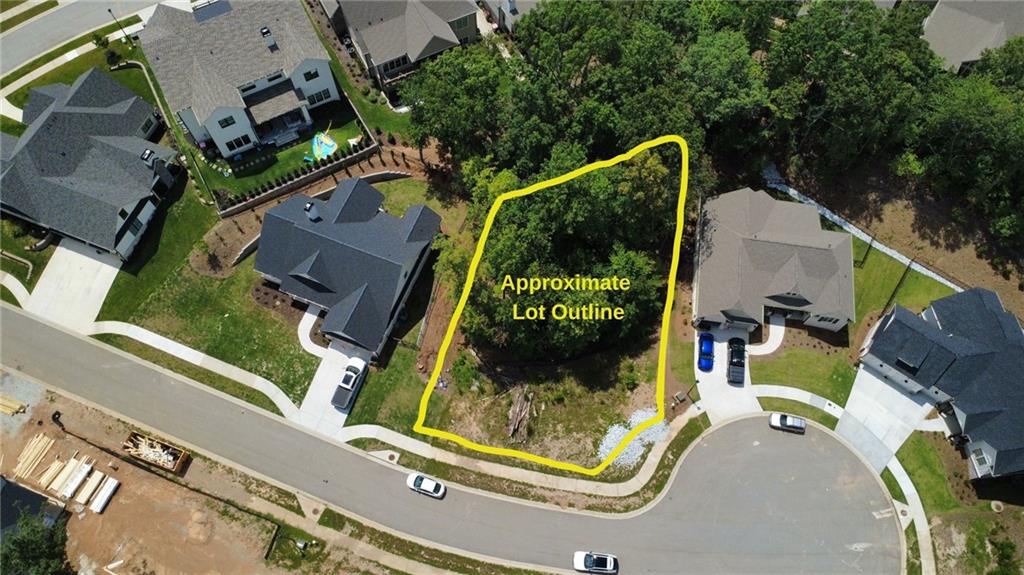 Motivated Seller!
Build your ideal home on this private cul-de-sac lot in the prestigious Marina Bay on Lake Lanier—a gated lakefront community offering the ultimate in resort-style living. Enjoy premium amenities including a private marina, resort-style pool, tennis courts, fitness center, clubhouse, and tree-lined sidewalks perfect for leisurely strolls. Conveniently located near downtown Gainesville, GA, with easy access to GA 985 and GA 400. This is your chance to create a serene retreat in one of Lake Lanier’s most desirable communities.