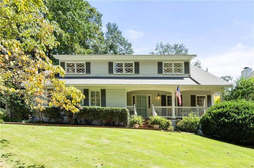 Located just blocks from Chastain Park, charm, sophistication, and modern comfort converge in this Cape Cod–style cottage. Perfectly sited on an idyllic lot, no detail has been overlooked in this completely renovated home, where timeless design creates a beautiful backdrop for elevated everyday living and effortless entertaining. At the heart of the home, a magazine-worthy kitchen takes center stage. Boasting a large center island, stunning quartzite countertops that flow seamlessly up the backsplash, and luxe full-height inset cabinetry, the showstopping kitchen opens to a spacious breakfast area, punctuated by a cozy fireplace. Custom built-ins add elegance and functionality in the adjacent family room, where a wet bar features a wine refrigerator and beverage center, offering convenience day-to-day and an ease to entertaining. The seamless flow between the indoors and out further enhances this exceptional setting for creating connection and memories- the family room opens onto a charming stone terrace with a water feature focal point, while the breakfast room flows into a spacious screened porch, and the formal dining room opens to a private patio featuring an outdoor kitchen. Upstairs, the oversized primary suite serves as a private retreat with a reading nook, multiple closets, and a marble-adorned bathroom with dual vanities, soaking tub, and separate shower. Three additional bedrooms, each having ample closet space, and two renovated bathrooms complete the second floor. The basement adds versatility with a fifth bedroom option, full bath, and separate outdoor entry — ideal for guests, play or a private office. The pool area, fully fenced and completely renovated in 2022 with new gunite, coping, decking and equipment, is complemented by an outdoor fireplace — making this home as luxurious outside as it is inside. Not only has every finish been refined but every system has been updated. This Chastain gem lives large while holding onto its warm, cottage-style charm and sophistication, truly offering the best of Atlanta living.