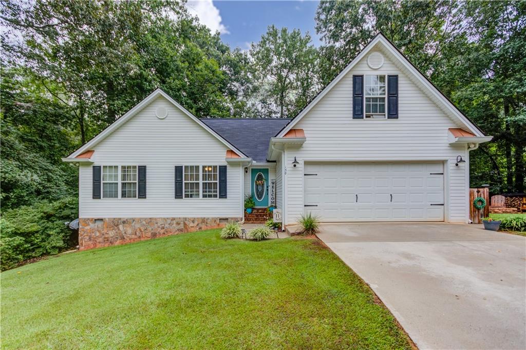 Sellers need to relocate!!! Come see this well-maintained home located in a desirable neighborhood! Sitting on the largest lot in the neighborhood with 570 feet of road frontage, this property includes part ownership of a private pond-enjoy fishing right from your backyard! Sit by the fire-pit or relax on the large covered porch perfect for entertaining. No HOA! HVAC system serviced twice per year, Septic system serviced in 2025, Wired for a generator and all appliances are just 1 year old. Seating around fire-pit and outdoor lighting will remain with the home for you to enjoy! $1,000 toward closing cost when using preferred lender.