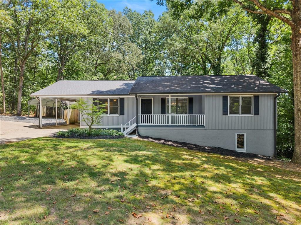 Charming Renovated Ranch on a Spacious Leveled Lot!
Welcome to 3651 Green Crest Rd A beautifully maintained 3 bedroom, 2 bath ranch offering comfort, convenience, and thoughtful updates throughout. Step inside from the inviting front porch and find the private primary suite tucked to the left, featuring a beautifully renovated en-suite bathroom. Across the spacious living area are two additional bedrooms and a second updated bathroom. The renovated kitchen is well-appointed with new stainless steel appliances and flows seamlessly into the dining area, which sits just in front of sliding glass doors that lead to a large back deck-perfect for entertaining or enjoying peaceful views of the expansive backyard. Additional features include a one-car attached carport, a two-car detached carport, and a half-finished basement/crawl space that offers excellent storage potential. With a large front and back yard, there's plenty of space to enjoy outdoor living. Don't miss your opportunity to own this move-in ready ranch home with modern touches and room to grow!