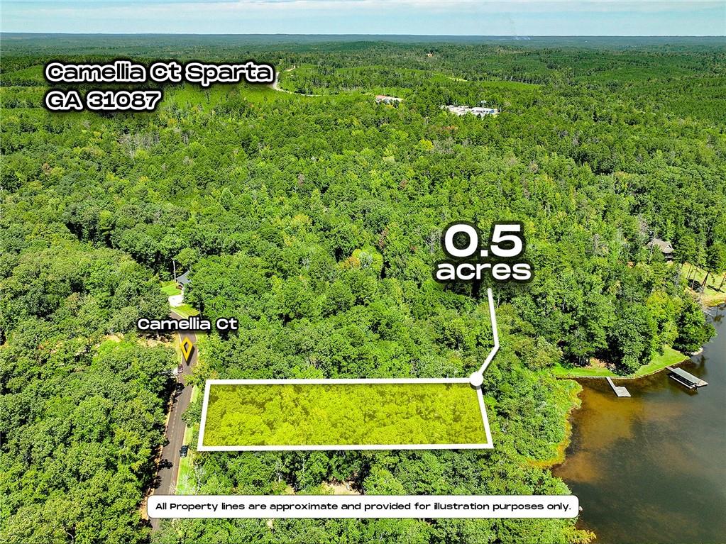 Lake Sinclair Frontage – This fairly level 0.5-acre lot offers an exceptional build site for a lakeside retreat with direct Lake Sinclair frontage. Ideal for a single-family lake home or weekend getaway, the property features serene water views, abundant morning light, and easy access. Level terrain minimizes site prep costs and maximizes space for a deck, patio, or private dock (subject to approvals). Direct waterfront access supports boating, fishing, and kayaking, while Sparta’s shops, dining, and services are just a short drive away.