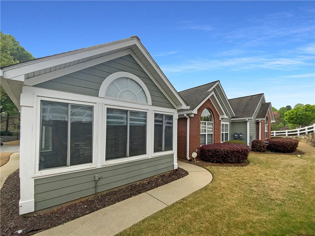 Welcome to this charming 3-bedroom, 2-bath home located in the well-maintained community of The Crossings at East Cobb. Situated in a highly sought-after Marietta location with top-rated schools, this home offers convenient one-level living and a low-maintenance lifestyle.
The spacious family room features vaulted ceilings, a cozy fireplace, and an abundance of natural light. A bright, window-lined sunroom offers the perfect space to relax or entertain. The kitchen is thoughtfully positioned next to the laundry room and provides easy access to the attached two-car garage.
The large primary suite includes a generous en-suite bathroom and a walk-in closet. Enjoy the many community amenities, including a clubhouse with an entertainment room and kitchen area, a pool, and a fitness center.
The HOA covers a wide range of services such as water, sanitation, roof and exterior maintenance, landscaping, pest and termite control, and lawn care. No rentals allowed, making this an ideal opportunity for owner-occupants seeking comfort, convenience, and community.