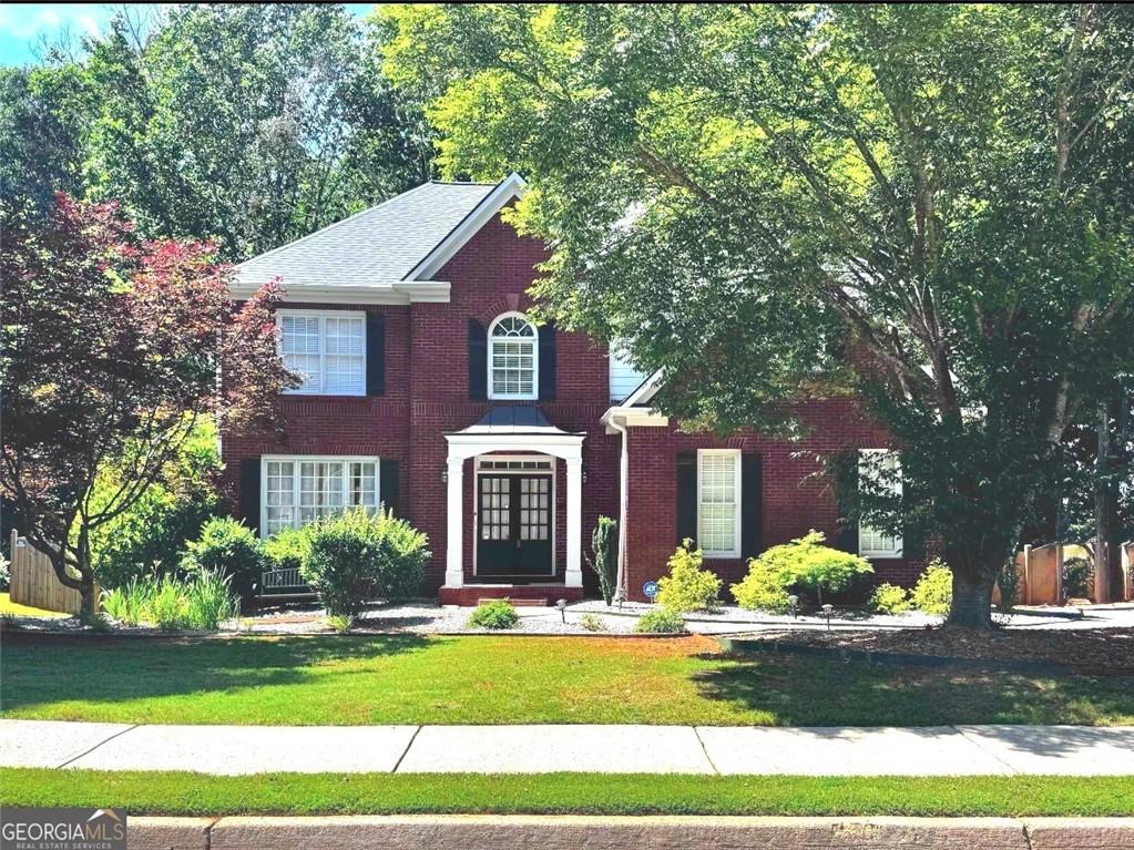 Welcome to this Beautifully Laid-out Home in the Exclusive Appalachee River Club Golf and Tennis Resort Style Community in Dacula, GA... Upgrade Alert includes New Roof, New Privacy Fence, New Paint (Interior and Exterior), New Water Heater...All less than 1.5 years. This Home Offers Tall Windows in the Living Area, Bringing in Tons of Natural Light to Every Corner of the Open Concept High Ceiling Living Space. In Addition to the Open Concept, A Large Foyer, Separate Formal Dining Room and Office/Formal Living Room Provides a Warm and Cozy Feeling upon Guest Arrival. The Built-in Bookcase Surrounding the Stone Fire Place takes that Cozy Feeling to the Next Level. This Home has a Large Finished Basement with Living/Family/Media Room, Dining Room/Game Room, Bonus/Exercise Room, with Full Bathroom and Wet Bar...Can also be used as a grand 5th Bedroom Suite. This Home Allows for a Mother-Daughter Option with a Private Exterior Entrance. This Property also Offers Almost Half Acre with Endless Landscaping Possibilities, with Privacy Trees and Fence. The Backyard has a Two Large Decks (One Enclosed) and A Patio... Perfect for Hosting and Entertaining Guest and Family. Location is Everything... Though this Home is Near All, it is Set in a Quiet Serene Neighborhood in the Sort-After Gwinnett School District Community....Near All!!!...Shopping, Dining, Mall of Georgia, Northeast Medical Center, Chateau Elan, Mulberry Park/Trail, Recreations/Activities! Schedule Tour Today...This Won't Last.