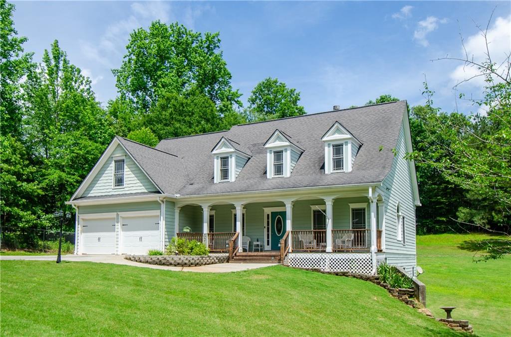 Beautiful Traditional home, on 1.05 private acreage. Very well maintained and move in ready. Master on Main with spacious Master bath. 2 more large bedrooms upstairs with a full bath. NEW Roof installed July 2025.
This is a one owner custom built home. Nestled on private acre lot, no hoa and plenty of room to expand. Popular Woodstock Schools, bring your RV, Boat, and Tractor for storage. NO HOA. Lovely home with plenty of space, very open large kitchen w/corian countertops. Hardwood flooring, Very large great room with plenty of room to entertain guests. Freshly painted finished room in the daylight basement and new carpet. Rocking Chair front porch and roomy back deck to enjoy summertime cook outs or sipping coffee on your front porch. This is a lovely home and is a must see!