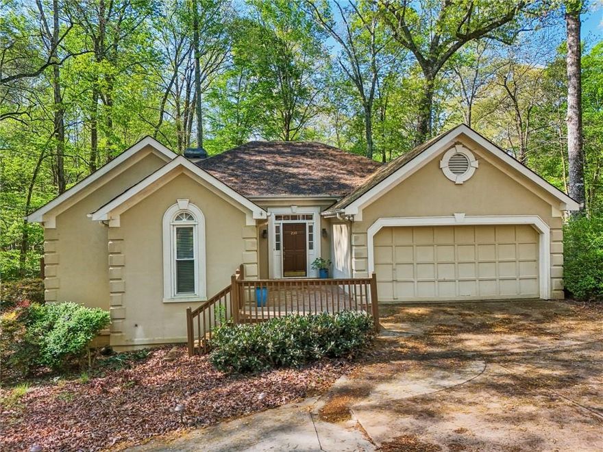 BACK ON MARKET, Buyer Financing fell thru, in the Prettiest Neighborhood just a very short walk from Downtown Alpharetta!  Come live the life you have dreamed of!  Imagine living next to a creek, in a neighborhood that looks like a garden and being super close to everything DT Alpharetta has to offer!  No HOA.  No Rental Restrictions.  This home and lot have a ton of potential!  Currently on Septic but the Sewer line is close by.  This 3 BR, 2.5 BA with an office has high ceilings and a Fireplace in the Great room.  Expansive Yard, Peaceful Deck and is served by Great Schools.  Expansion would be easy as its zoned R-15 with generous setbacks.  Current owner is not required to pay for flood insurance.  Builders Welcome!