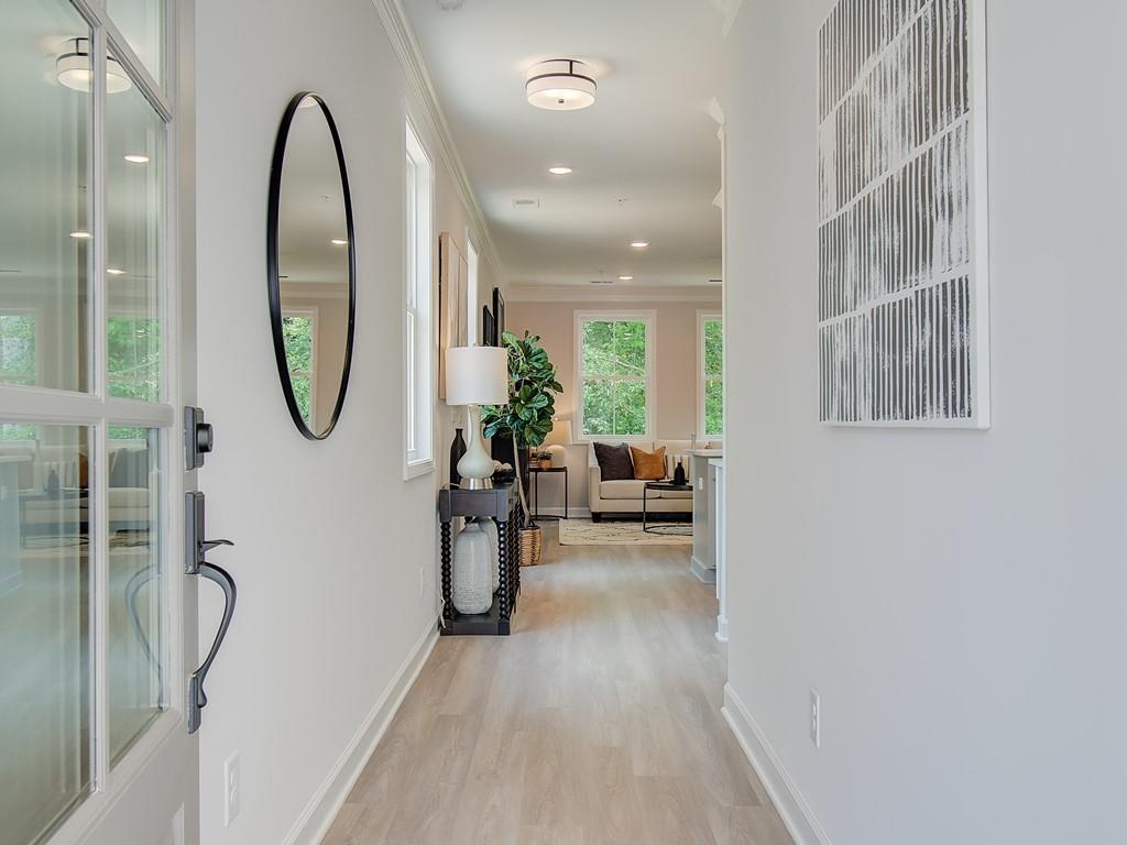 Traton Homes welcomes you to Winsome Park located in Woodstock Georgia. Our award winning Brooks H floorplan early 2026 and is optimized for entertaining, working from home and a lock and leave lifestyle. With a kitchen that WOWs, you will love the large center island with quartz tops, seating for 4 and plenty of prep space. There is also a walk-in pantry and gas cooking. Light from multiple windows floods your family room and dining areas and is a wonderful place to gather with friends and family. Upstairs is a flexible loft area perfect for a home office, play space or sitting area. The oversized Owner’s suite includes a sitting area, huge closet and nicely appointed bath with spacious shower, dual vanity and linen closet. Secondary bedrooms are very generously sized and share a full bath. The best part of this home will be the Covered Patio area! This home should be ready to move in August 2025. Home is under construction. PHOTOS WITH FURNITURE ARE STOCK PHOTOS AND ARE NOT OF ACTUAL HOME. See agent for information about a special rate buydown incentive for this home!