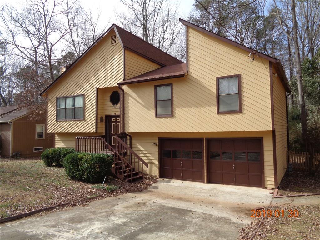 Contemporary Split foyer home on finished basement. Main level has three bedrooms and two full baths. NEW FLOORING, carpet ad laminate. NEW PAINT INTERIOR AND EXTERIOR, Newer roof. Newer water heater. New boards on both front and back decks. Finished basement has a second family room with 4th bedroom and full bathroom. Large back deck overlooking private level yard.