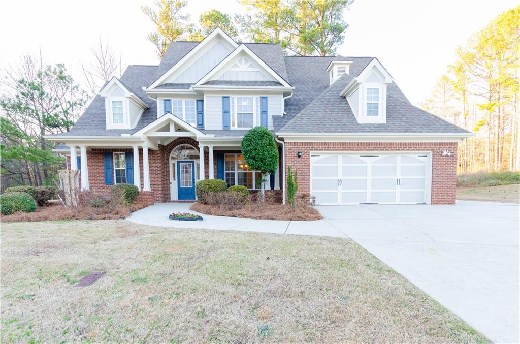 CLOSE BY THE END OF SEPTEMBER AND SELLER WILL FENCE IN THE BACKYARD OR PROVIDE A CREDIT OF UP TO $7500!! This RARE 4-sided brick home in a quiet cul-de-sac. The neighborhood filled with semi-custom homes is so peaceful and laid back. Conveniently located across the street from a county park and down the street from a Gwinnett County police station as well as adorable downtown Grayson just a short drive away. Walking up to the house passed the manicured landscape and over the large front porch, you enter the house through the 2-story foyer. To your right is a formal dining room also open to the kitchen. In front of you is a two story family room with a brick fireplace. From there to your left is a half bath and the entrance to the master suite. The master suite has high ceilings and a professionally mounted smart TV. The master bathroom features a dual vanity, separate tub/shower, WC and large walk-in closet. The kitchen has been newly outfit with ALL NEW stainless steel appliances (dishwasher, cooktop, built-in oven and microwave) Granite counters, stained cabinetry and a separate pantry and eating area round out the amenities of this kitchen. Off the kitchen is a separate keeping room also outfit with a professionally installed smart TV. The stairs to the second level are nicely tucked back off the keeping room. Upstairs you will find four more bedrooms and two more full bathrooms! One of the upstairs bedrooms features custom finished two walled shelving (this room was formerly used as an office but would make an ideal nursery, play room or simply as a bedroom) They just don't make them anymore at this price point! With brand new LVP flooring throughout the main level and fresh white paint throughout the entire home this home is a steal of a deal in this school district. The HVAC are newer as well! Both mounted smart TV's can stay with the home! This is not an opportunity you want to miss!