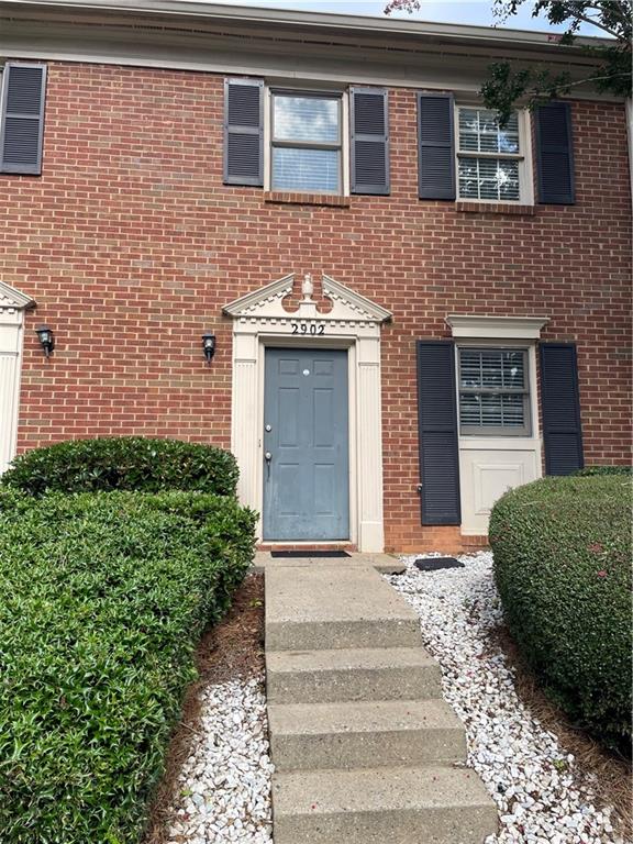 FANTASTIC LOCATION! Walkable to Avalon and downtown Alpharetta, quick access to Hwy 400, this is where you want to be. Available immediately. This 2 bed / 2.5 bath is set up for roommates and is located right across the parking lot from the community pool and tennis courts. Large living room with fireplace, private back patio. Additional storage closet in back. Comes with a washer & dryer.