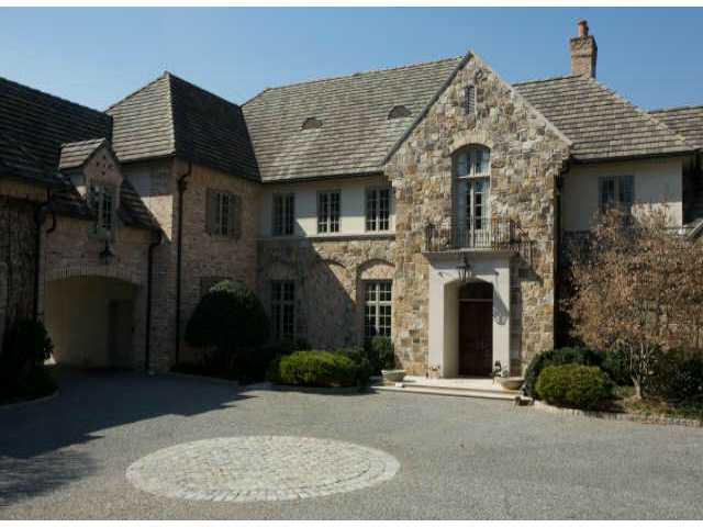Gorgeous custom built home on private 2+/- acres with 12+ foot ceilings, custom kitchen with island overlooking keeping room with cathedral beamed ceiling and stone fireplace with built ins. Heart of pine floors on main level. Wonderful pool off main level living.