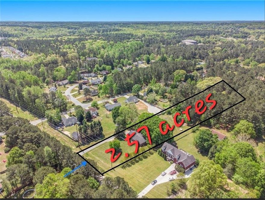 All Brick Ranch in Sought-After GRAYSON School District on 2.57 acres, Flat Style.w/Plenty of Space for PARKING, STORAGE, & PLAY! The POSSIBILITIES are Endless! Rocking-Chair COVERED FRONT PORCH Overlooking Relaxing Front Yard. ONE-LEVEL Living w/MASTER ON MAIN! The Great Room features a fireplace with a wood-burning insert. Office Space, 2-CAR GARAGE, and ADDITIONAL STORAGE! Enjoy the private backyard, 2-car side-entry garage, and a Storage Room. The Nice Front Porch has enough space for a swing or rocking chairs. Plenty of room for a garden, plus there are apple trees and a large wooded area at the back of the property. SPRAWLING LOT includes FRUIT TREES, PRIMITIVE BARN, & LIVESTOCK-FENCED AREA. Potential for ADDITIONAL HOMESITE at Back of Lot. Desirable area CLOSE to schools, new residential development, DINING/SHOPPING, Downtown Lawrenceville, Loganville, & Snellville!! Move-In Ready!