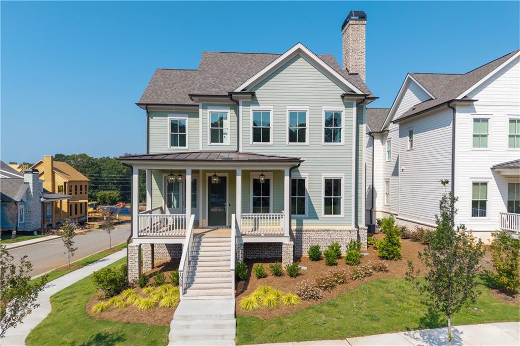 Our preferred lender has 5% rates!! Call for more information! Perfectly designed for today’s on-the-go homeowner, this stunning residence in the Village section of Crossroads offers the ultimate lock-and-leave lifestyle. With HOA-maintained grounds and sewer service included in the monthly fees, you’ll spend less time on upkeep and more time enjoying everything this sought-after Milton community has to offer. The heart of the home is the chef’s kitchen—an entertainer’s dream—showcasing custom ceiling-height cabinetry, quartz countertops, a porcelain farmhouse sink, and a professional-grade 48" Thermador gas range with six burners, griddle, and double ovens. A walk-in pantry provides both function and organization, keeping essentials neatly tucked away. The main level is filled with natural light and features an open-concept design with a dedicated dining space and a seamless flow for everyday living and entertaining. Upstairs, a spacious flex area offers room for a media space, playroom, or home office, while three additional bedrooms provide comfort and privacy. The unfinished terrace level is a blank canvas, ready for your personal touch—whether that’s a gym, home theater, or guest retreat. Blending refined style with low-maintenance ease, this home is just moments from dining, shopping, and services, and is served by top-rated Milton schools. It’s not just a home—it’s a lifestyle.