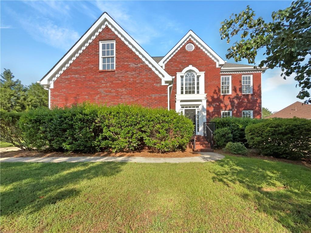 Welcome to this beautifully maintained 4-bedroom, 2.5-bathroom home in the sought-after Brookwood school district! Situated on over half an acre, this spacious home offers comfort, functionality, and convenience in a well-established neighborhood. Step into the inviting two-story foyer that sets the tone for the light-filled interior. The formal living and dining rooms provide elegant spaces for entertaining or hosting family gatherings. The open-concept layout connects the kitchen and family room, making it ideal for everyday living. The eat-in kitchen features classic white cabinetry, a center island, and ample counter space, while the family room offers a cozy fireplace as the perfect focal point for relaxing evenings. Upstairs, the vaulted primary suite impresses with its generous sitting area, walk-in closet, and luxurious bath featuring dual vanities, a jetted soaking tub, and a separate shower. Three additional bedrooms share a full bath, and one of them offers direct access—perfect for guests or a teen suite. The laundry room is conveniently located upstairs, close to the bedrooms for added ease. Recent upgrades include a brand-new HVAC system, fresh interior paint, and new carpet, making this home truly move-in
ready. Enjoy outdoor living with the spacious backyard offering room to relax, play, or garden on this expansive lot. Ideally located near Five Forks Trickum Rd, Ronald Reagan Parkway, and The Shoppes at Webb Ginn, you'll enjoy easy access to shopping, dining, parks, and top-rated schools. Don’t miss this opportunity to own a stunning home in one of Lilburn’s most desirable areas!