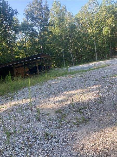 8 Acres which for room to spread out. Road is cut and it's ready to either be developed or subdivided. Currently one lot, may be able to be subdivided, has a small stream on the property. There is a stream. A great piece of property is someone wants a lot of privacy and a great building lot.