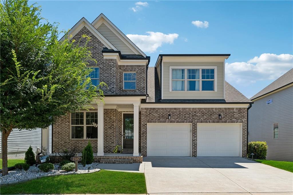 Welcome to this NORTH FACING HOME. Step into timeless charm in this gorgeous Snellville masterpiece—a true gem in the coveted Brookwood neighborhood! Beautiful dark hardwoods flow throughout the entire home, paired with a bright neutral palette that radiates warmth. A grand two-story entryway will delight you, setting a tone of timeless elegance. The expansive chef’s kitchen overlooks the living area and shines with stainless appliances, sleek quartz counters, double ovens, a gas cooktop, a large island and a wet bar ideal for whipping up your favorite meals / drinks or hosting festive get-togethers. The open-concept living area, accented by a cozy fireplace, creates a positively chic space perfect for lively gatherings or quiet evenings at home.
Four spacious secondary bedrooms with standing showers and walk in closets offer ample room for family, guests, or hobbies, while the stunning owner’s suite boasts trey ceilings, a walk-in closet with built-ins, and a gorgeous ensuite featuring double vanities, a soaking tub, and a large shower for ultimate relaxation. A full, finished basement adds versatility with a bedroom, full bathroom, living area, and kitchenette—perfect for movie and game nights or accommodating visitors. Step outside to a screened-in porch overlooking a fenced backyard and patio, ideal for al fresco dining under the stars or sunny afternoon barbecues. The Brookwood neighborhood perfectly complements your lifestyle with a large pool and playground for endless fun. You’ll find idyllic suburban living just minutes from downtown Snellville, with vibrant shopping, dining, and easy access to Ronald Reagan Pkwy, plus zoning for prestigious Brookwood High School. Schedule your showing today and discover the life within Snellville you’ve been dreaming of!