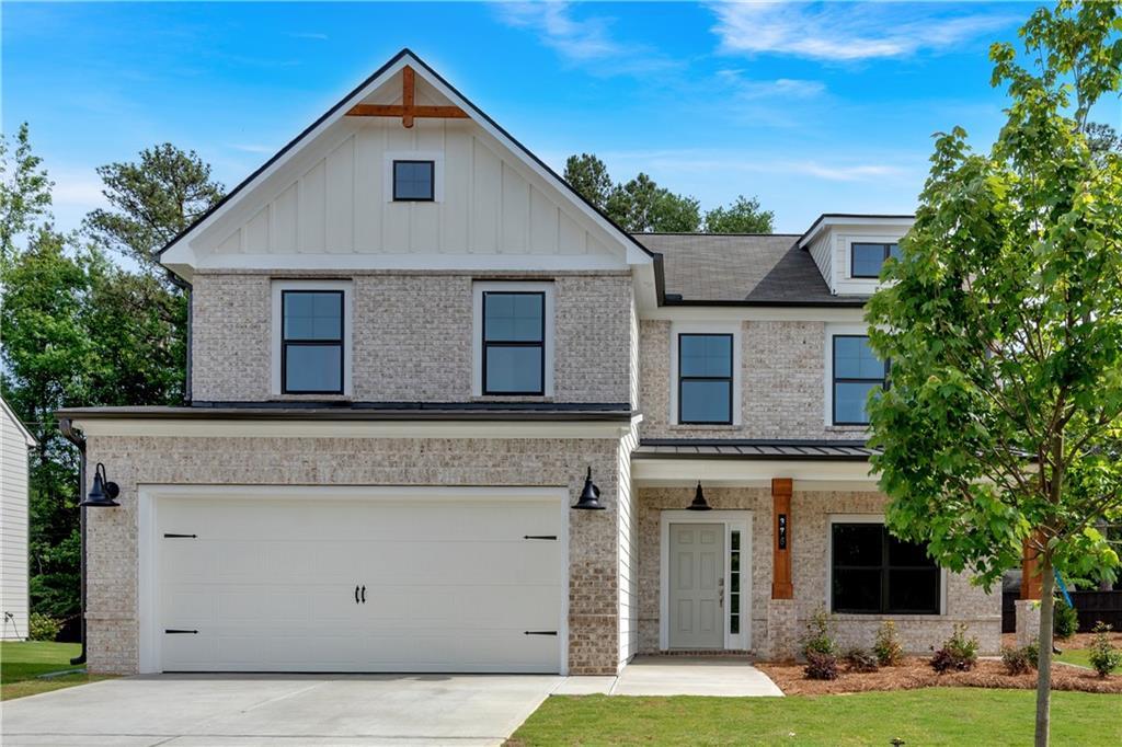 Presenting The Axley, a beautifully designed 4-bedroom, 2.5-bathroom home from Kerley Family Homes' elegant Georgian Series, located in the sought-after Overlook at Factory Shoals community. This two-story residence features an open-concept kitchen and family room, perfect for entertaining, along with a separate dining room for formal gatherings. The gourmet kitchen boasts modern finishes, including sleek countertops and ample cabinet space, while a convenient half bath serves guests on the main level. Upstairs, you'll find a spacious primary suite with a luxurious en-suite bathroom featuring a separate tub and shower, along with three additional bedrooms and a well-appointed secondary bathroom. Nestled just south of downtown Mableton, this home offers easy access to parks, dining, shopping, and entertainment, blending suburban charm with urban convenience. With an estimated completion in April, this is your chance to own a stunning new build in a prime location. Schedule your tour today--this home won't last long!