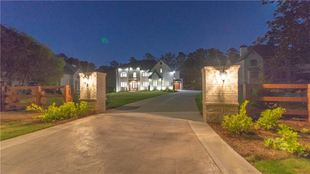 This luxury residence is a true masterpiece of modern construction, featuring top-tier materials and cutting-edge technology for enhanced comfort, energy efficiency, and durability. The house boasts three oversized master bedrooms, each with its own luxurious master bathroom. These bathrooms feature a standalone bathtub, separate shower, his-and-her vanities, and spacious walk-in closets, offering both comfort and elegance.
Special Construction Features:
Upgraded 2x6 Framing: The exterior walls are built with 2x6 framing, providing a stronger structure, improved insulation, and a higher R-value, offering superior energy efficiency compared to the commonly used 2x4 framing.
Three-Level Elevator: A custom elevator serves all four floors, including the basement, ensuring seamless access to every level.
European German Engineering Windows & Doors with Triple Glass: High-performance, energy-efficient, and soundproof windows and doors offer exceptional insulation. 
Foam Spray Insulation: Applied throughout the home, this superior insulation enhances energy efficiency, soundproofing, and moisture control. It helps prevent mold and mildew growth, making your home healthier and more comfortable. Soundproof walls in all bedrooms, bathrooms and laundries. 
Copper Pipes Plumbing: Unlike standard PVC pipes, the copper pipes installed here offer longevity, durability, & quieter water flow. Additionally, copper's natural antibacterial properties kill bacteria and germs.
4-Car Garage: The spacious garage is finished with decorative wood covering for an elegant touch & electric car charge outlet
Top-of-the-Line Appliances: Viking Appliances: The kitchen is outfitted with Viking’s premier range of appliances, known for their professional-grade quality, innovative features, and sleek design. Whether you're a home cook or a professional chef, Viking ensures unmatched performance & style in the kitchen.
Luxury Finishes Throughout: 
Custom Cabinetry: Soft-close custom-made cabinetry is installed throughout the home, designed for both beauty and functionality. 
Natural Stone & Tile: Natural stone, marble tile, and quartz or granite countertops are featured throughout, adding timeless elegance.
Three Concrete Fireplaces: These fireplaces are ready for custom artistic painting by a professional if desired, offering a unique opportunity for personalization.
Ironwork & Molding: Intricate decorative ironwork, including balconies, and custom crown molding, chair rail molding, & paneling adorn the interiors. Vaulted ceilings create a grand atmosphere.
High-Quality Flooring:
Red Oak Hardwood: Red Oak hardwood floors run throughout the home, with no carpeting for a sleek and seamless finish.
Exterior Features:
Four-Sided Brick & Natural Stone Exterior: The home's exterior features four-sided brick & natural stone, extending even to the back, where most builders opt for cheaper materials. This attention to detail creates a stunning, long-lasting façade.
Pre-Wired for Future Upgrades:
Security & Audio Systems: Pre-wired for home automation including security, audio systems, & future remote-controlled gates, with security cameras and audio speakers already installed.
Outdoor Amenities:
Sprinkler System: A full sprinkler system covers both the front & back yards, ensuring easy maintenance of your landscaped grounds.
Energy Efficiency & HVAC:
Tankless Water Heaters: Two high-efficiency tankless water heaters & a hot water circulation system provide endless hot water while minimizing energy use.
TRAN HVAC System: The high-efficiency HVAC system ensures optimal climate control year-round.
Attic Accessibility: The entire attic is covered with plywood, providing easy access for storage and maintenance.
This home offers a exceptional quality craftsmanship. Please review the property video tour at the link above which is associated w/virtual tours and schedule the showing. There are three homes available w/different floor plans to choose from.
