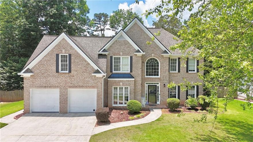 Discover your dream home in one of Georgia's most desirable communities! Close to I-85, Collins Hill Park, lake recreation, and so on! Nestled in a quiet neighborhood, 445 Sweet Ivy Ln offers a perfect balance of charm, space, and modern convenience. This beautifully maintained residence features 5 spacious bedrooms, 3 full bathrooms, a recently renovated kitchen, a spacious living room, a fully enclosed sunroom with hardwood flooring, and a large backyard. The home is fully repainted, with all the restrooms just renovated before the listing. On top of that, the full renovation was less than a year ago! The backyard was fully redesigned after the current owner's occupancy, adding many functional features but maintaining the privacy setting. The fully enclosed sunroom provides extra indoor recreation spaces, rain or shine. It is a true gem waiting for its next owner.