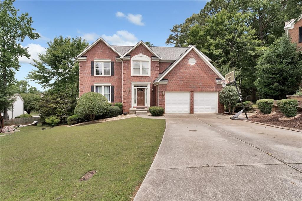 Prepare to be blown away by this extraordinary, modern executive home nestled on a cul-de-sac lot within the beautiful Pennbrooke community.
Indulge your inner chef in the updated chef's kitchen. Adorned with white cabinets, glistening granite countertops, and top-of-the-line stainless steel appliances! The open living space boasts solid hardwood floors throughout the main level, creating a warm and inviting atmosphere. In addition to the spacious main living area, there are separate living and dining spaces, providing versatility for your lifestyle and entertaining needs. The large master bedroom is a true retreat, featuring a custom closet, abundant natural light, and an updated master bath. The renovated master bath showcases a shiplap wall, tiled floors, shower with tiled walls and floor and soaking tub, all complemented by granite countertops. The upper level of the home includes three additional spacious bedrooms, along with an updated secondary bathroom. The fully finished basement is a fantastic bonus, with new flooring, offering a bedroom, full bathroom, wet bar, and recreation room and theatre room. This space provides endless possibilities for relaxation and entertainment. Step outside and discover your own private oasis within the partially fenced backyard. The large deck is perfect for hosting gatherings and enjoying outdoor activities. The property's location is ideal, just minutes away from Avalon, downtown Alpharetta, great schools, and GA400, providing easy access to a plethora of amenities and attractions. Don't miss the opportunity to make this beautiful home yours. Schedule a viewing today and experience the luxury and comfort it has to offer.