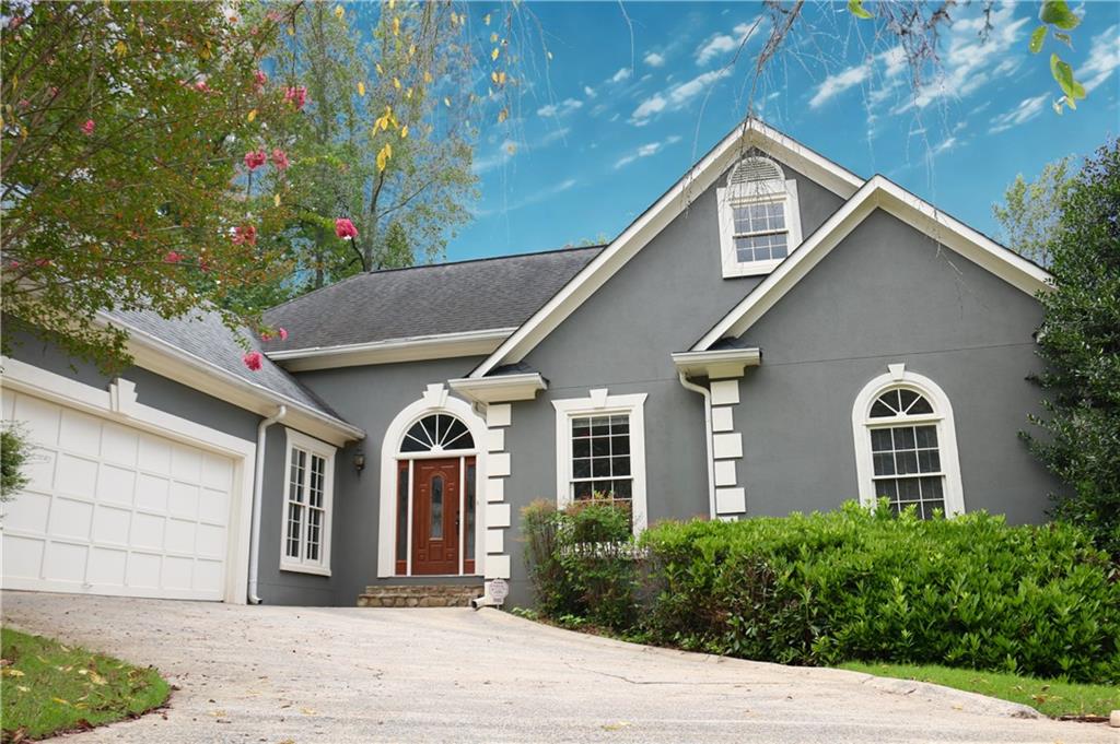 RARE FIND: Primary on the Main in the prestigious Guilford Forest neighborhood. This massive home delivers unmatched value with a finished basement/apartment featuring a private entrance, full kitchen with two refrigerators, dishwasher, microwave, pantry, full bath, cedar storage room, utility room with sink, and so much more. Perfect for guests or multi-generational living. Highlights on the main level includes two additional bedrooms, a family room, dining room, sunroom with a double-sided fireplace, a gourmet eat in kitchen with granite countertops, new refrigerator, double ovens, trey ceiling, refinished hardwood floors, new carpet, and fresh paint. The upstairs offers a loft, a private bedroom with skylight and full bath. Public records do not include the correct square footage. Some pics are AI generated.