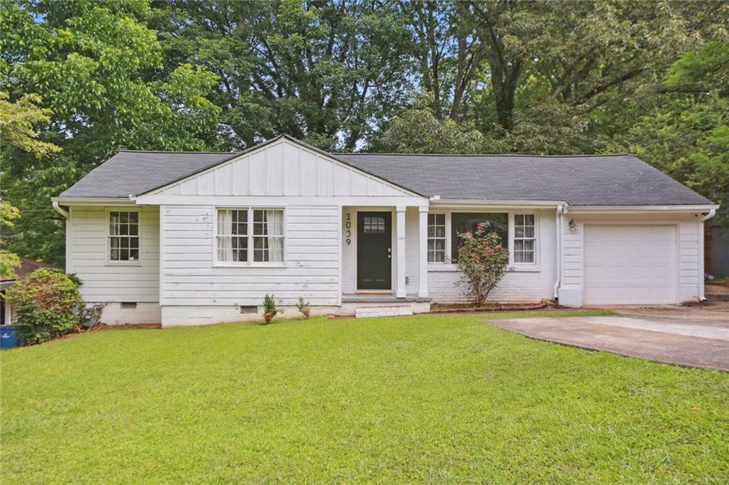 Welcome to 2039 Neely Ave, nestled in the highly sought-after Historic Conley Hills neighborhood of East Point, GA! This recently renovated bungalow, built in 1955, seamlessly blends modern updates with its original charm with its original hardwood floors throughout, granite countertops, and modern fixtures. Offering 3 bedrooms, 2 bathrooms, an owner's suite with a walk-in shower, a convenient 1-car garage, and a fenced-in backyard, this home is an absolute gem. Step inside and be greeted by a beautifully designed interior that effortlessly combines contemporary features with timeless character. The open floor plan creates a spacious and inviting atmosphere, perfect for both relaxing evenings and entertaining guests. The kitchen has been thoughtfully updated with modern appliances, stylish cabinetry, and sleek countertops, making it a true delight for any culinary enthusiast. Adjacent to the kitchen, you'll find a cozy dining area where you can enjoy meals with family and friends. The bedrooms provide a tranquil retreat, offering ample space and comfort for a good night's sleep. The bathrooms have also been meticulously renovated, showcasing modern fixtures and finishes that add a touch of luxury to your daily routine. Beyond the charming confines of the home, you'll discover the convenience of being in the Historic Conley Hills neighborhood. This location grants you easy access to a variety of local parks, where you can enjoy outdoor activities, picnics, and leisurely strolls. Notably, East Point boasts a rich history and a thriving community, with plenty of attractions and amenities to explore. The nearby East Point Historical Society showcases the city's heritage, while the charming Main Street is lined with local shops, restaurants, and cafes, perfect for a day of leisurely browsing or dining. Furthermore, the proximity to Atlanta offers endless opportunities for entertainment, cultural experiences, and employment options. Enjoy easy access to major highways and public transportation, making commuting a breeze. Don't miss out on the chance to own this recently renovated bungalow in the heart of Historic Conley Hills. Embrace the perfect blend of modern living, historic charm, and the convenience of nearby parks, local attractions, and easy access to everything East Point and Atlanta have to offer. Schedule your viewing of 2039 Neely Ave today and envision the possibilities of calling this place your home!