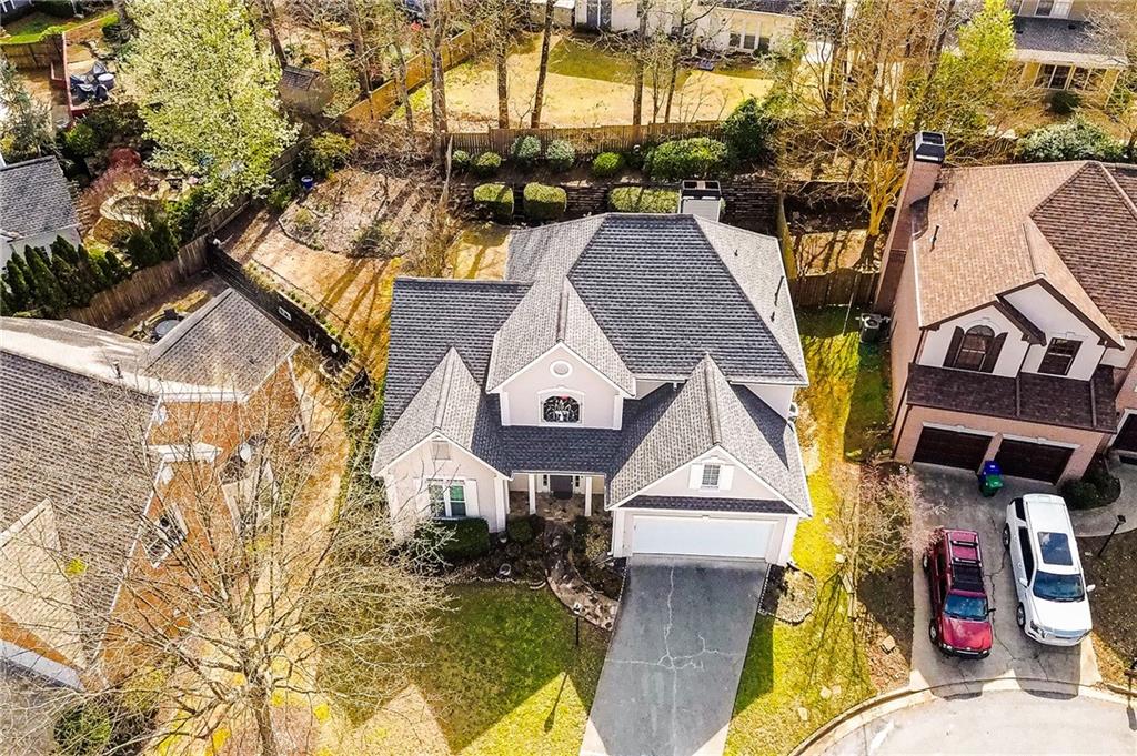 HOUSE ON THE HILL IN A CUL-DE-SAC!!! This home offers a mix of city and suburbia living in a well established community within 285. The open-concept on the main level includes the master bedroom, gourmet kitchen with premium appliances, granite countertops, and a large living and dining area; great for entertaining. Don’t forget to view the bonus room off the bedroom upstairs. The heating source is GAS with a smart thermostat. Double car garage with exterior garage door panel. The backyard has updated landscaping and well manicured. The home has a newer roof that was replaced in 2021 and insulated foam attic to assist with energy costs. Conveniently located near top schools, dining, and shopping; this home provides both comfort and accessibility. Don’t miss this opportunity to own a modern home that is meticulously maintained in a prime location with TOP RATED schools. Executor has full authority to execute sales contract and can close at escrow. ESTATE WILLING TO PAY BUYER COMPENSATION.