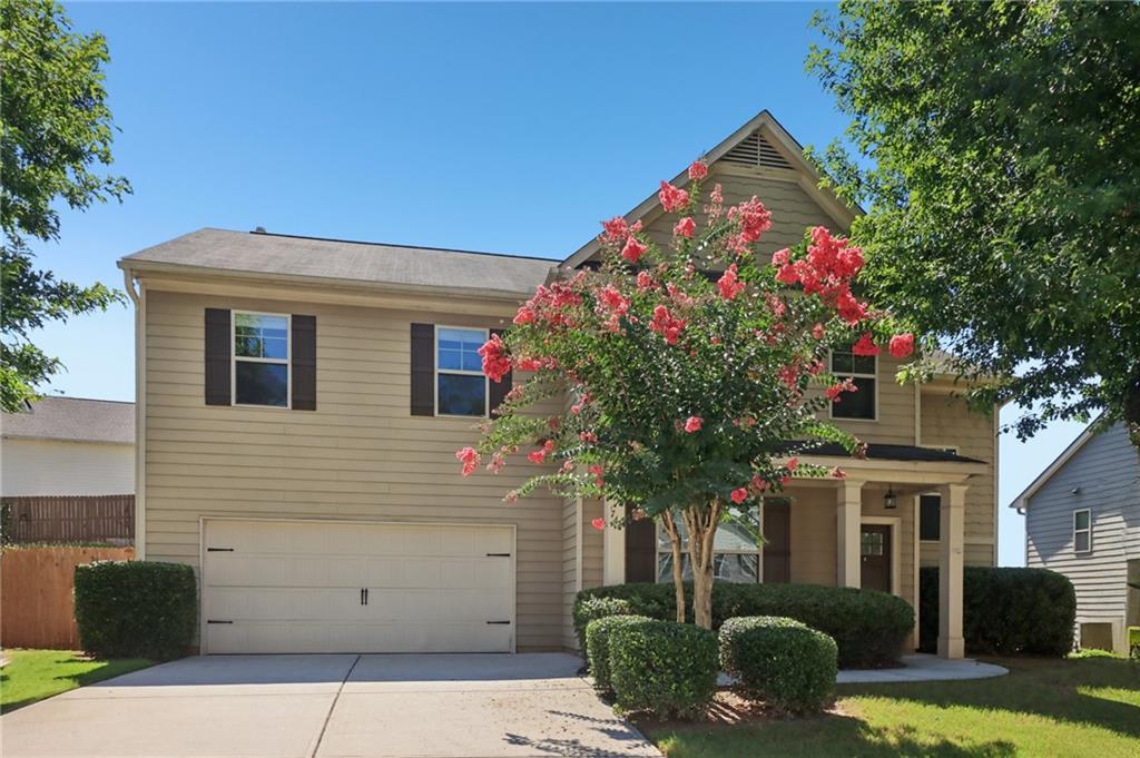 Discover comfort and convenience in this beautifully maintained 5-bedroom, 3.5-bathroom newer home offering stylish living space—without the new construction price tag!
Step into an elegant foyer that flows seamlessly into a formal dining room, perfect for entertaining. Functional open-concept layout of the fireside living room and kitchen, featuring an oversized island with breakfast bar, updated appliances, walk-in pantry, and plenty of counter space for meal prep and gatherings.
The main level includes a private bedroom and full bath—ideal for guests or multi-generational living.
Upstairs, a spacious loft area provides the perfect flex space for a home office, media room, or play area. The expansive primary suite boasts vaulted ceilings and a luxurious en-suite bath with a soaking tub, separate shower, and dual vanity. Three additional light-filled bedrooms with vaulted ceilings, a full hall bath, and a convenient laundry room complete the upper level.
Enjoy the outdoors in your large, fenced backyard with a patio—perfect for grilling, relaxing, or entertaining.
Located in a desirable Braselton neighborhood, this home offers space, function, and value. Don’t miss your chance to make it yours!