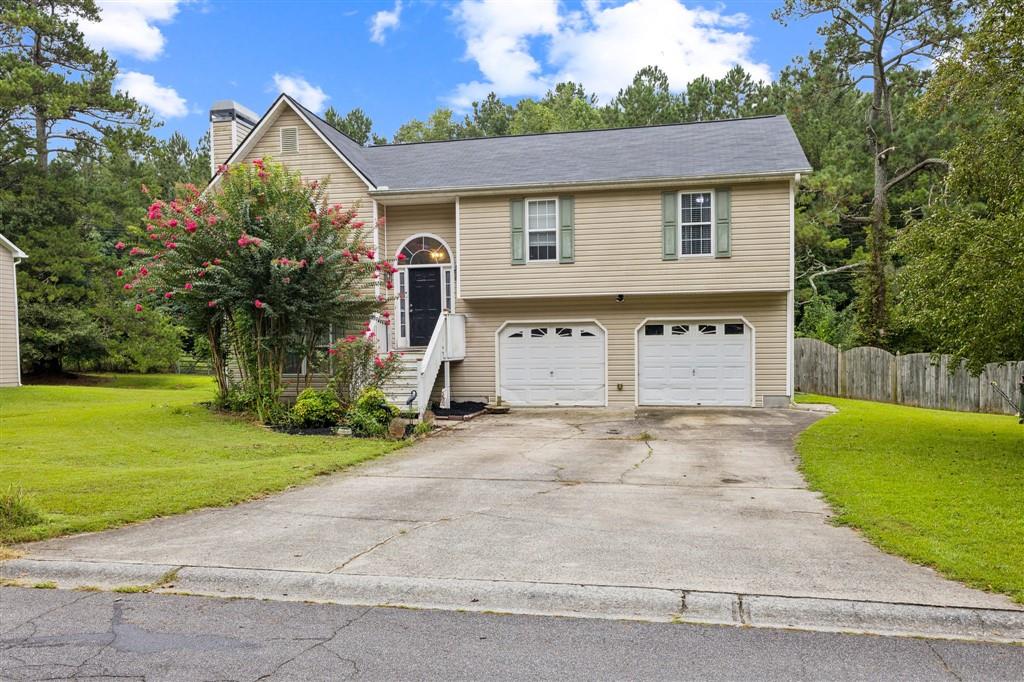This well-kept 3-bed, 3-bath home sits on a spacious lot in Austell’s Harcourt Manor.
It features a bright vaulted living room with fireplace, separate dining, and an eat-in kitchen.
Full unfinished basement offers expansion potential. Also enjoy a two-car garage, fenced yard, and great location close to shops, easy commute to Atlanta, close to parks and schools, and commuter routes.