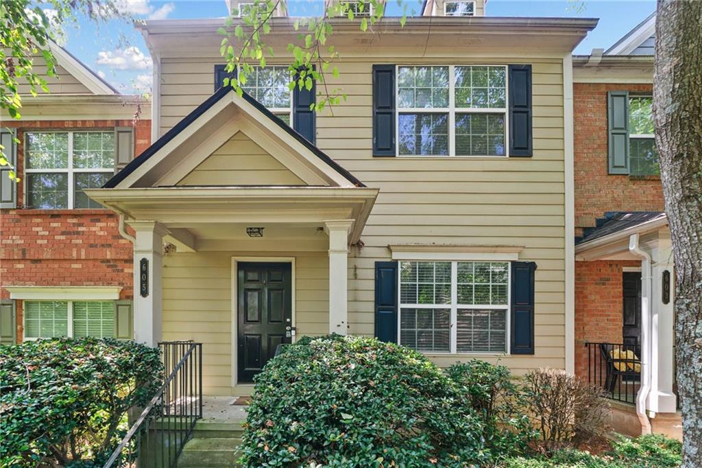 Tri-level townhome in charming Woodstock! Second-story main level with rear deck off the kitchen. Brand new stainless appliances. Third level owner's suite with large walk-in closet and ensuite bath with oversized tub/ shower combo. 2 additional bedrooms, full bath and laundry upstairs as well. Finished room in basement would make a great home office, gym, media room, etc... Neutral paint throughout. Located down the street from The Outlet Shoppes at Atlanta and a host of other shopping and dining options, as well as parks, and walking and biking trails. Very close access to I-575 and just a short drive to charming Downtown Woodstock.