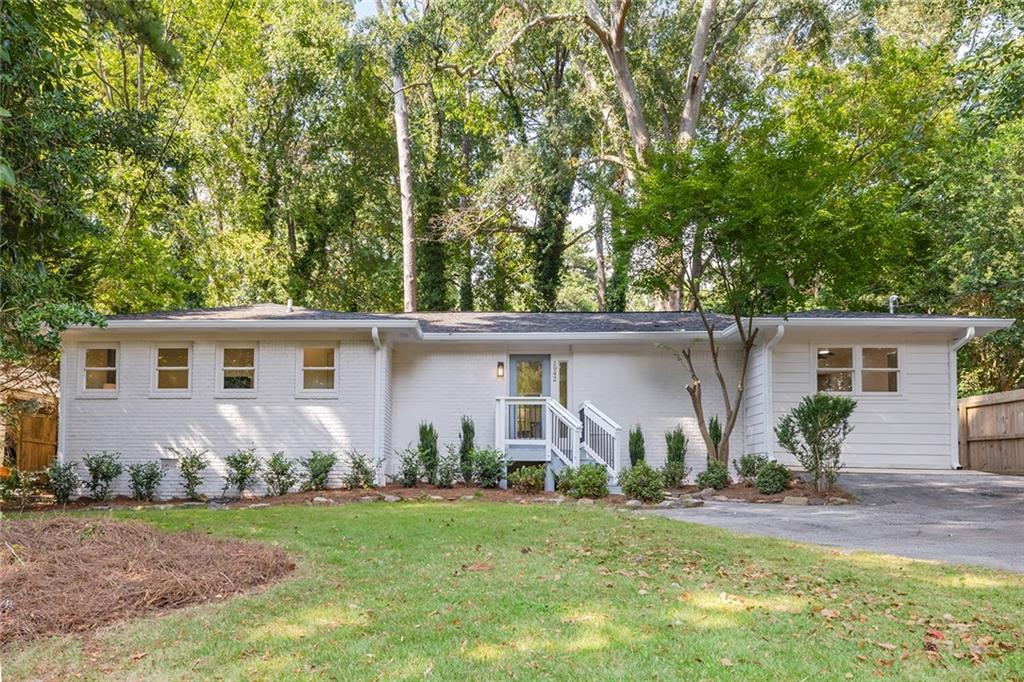 Looking for a like-new, one-level home (without the million-dollar price tag)?… THIS IS IT!
This Chamblee beauty was taken down to the studs and rebuilt with PERMITS—essentially new construction with all the modern upgrades you’ve been searching for. No detail was spared: brand-new roof, windows, HVAC, plumbing, and electrical systems, plus designer finishes throughout.
The open-concept floor plan is a showstopper with vaulted ceilings, a bright chef’s kitchen, and seamless flow into the living and dining spaces. The spacious primary suite and spa-like bath are tucked on the main level along with three additional bedrooms. Outside, enjoy the walk-out backyard—perfect for entertaining, pets, or playtime.
This home is truly custom—not builder grade—and offers worry-free living in a prime location. Just minutes from Buckhead, Brookhaven, I-85, CHOA, and the upcoming Peachtree Creek Greenway, it combines style, convenience, and peace of mind.
You won’t find another Intown home with this level of renovation and detail at this price point. THIS IS IT!