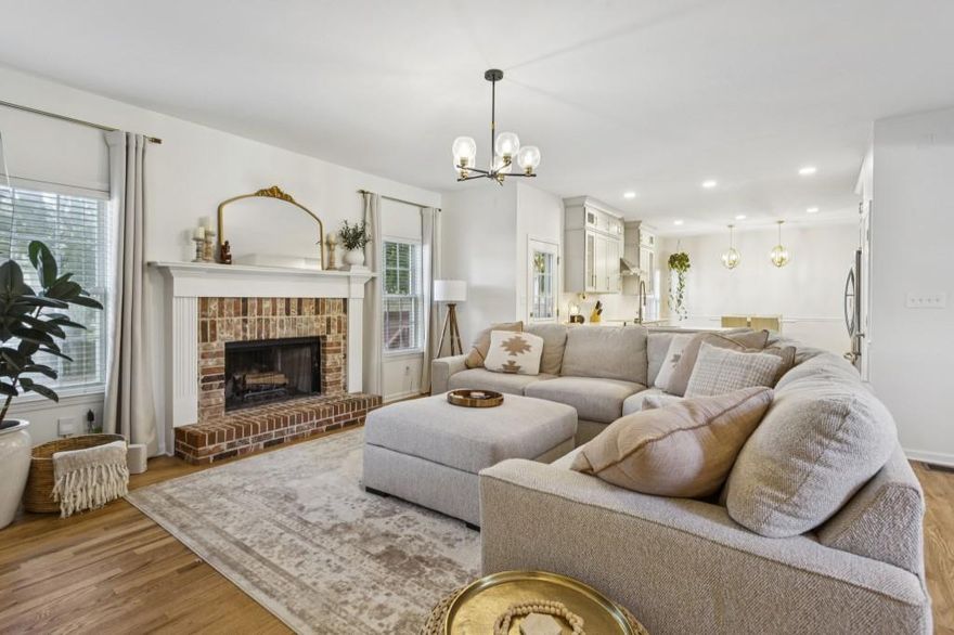 Explore this Stunning Estate-Style Home in Alexander Farms! Step into luxury living in this beautifully updated home boasting a separate 1 Bed/1 Bath In-Law Suite Apartment with its own entrance, adding both convenience and income potential. Nestled on a corner lot in the coveted Alexander Farms Community, this residence stands out as one of the largest and is in the prestigious Hillgrove High School District. The exterior charms with a lush front yard and meticulously landscaped surroundings featuring Crape Myrtles, Boxwoods, and blooming bushes, enhancing the curb appeal. As you enter, a well-lit two-story foyer welcomes you with gleaming hardwood floors, a grand staircase, and exquisite crown molding. To your left, you'll find a Formal Living Room (perfect for a Home Office/Library), and to your right, a Formal Dining Room with Wainscoting Walls that seamlessly flow into the Fireside Family Room. The heart of the home, the updated chef's kitchen, is a true masterpiece with Shaker Dove Soft-Close Cabinets, top-of-the-line stainless-steel appliances, Quartz countertops, and elegant brass finishes. Adjacent, a sunlit breakfast nook offers a charming space for casual dining or enjoying morning coffee. On the upper level, the oversized Owner's Suite impresses with a tray ceiling, a sitting area featuring a modern stone fireplace, and dual walk-in closets. The spa-like ensuite bathroom boasts a double vanity, soaking tub, and separate shower. Additionally, three more bedrooms and two full bathrooms provide ample space for family, guests, or a home office. The fully finished daylight basement adds versatility with a self-contained Apartment/In-Law Suite offering a private entrance, full kitchen, laundry room, bath, and separate garage. During their ownership, the sellers rented out the lower-level apartment, highlighting its excellent potential for additional income or extended family use. Outside, enjoy the meticulously landscaped, fully fenced backyard with a generous deck, updated fire pit, and ample room for outdoor activities, gardening, and entertaining!