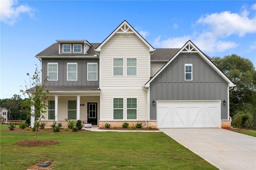 Built by EMC Homes GA, Move-in Ready Summer 2025! *** Buyer Incentive $15,000 ANY WAY YOU WANT IT with preferred lender.***The Carden Plan 5 beds/4 baths. Enjoy a picturesque wooded view from your lovely COVERED BACK PORCH. Covered Front Porch, Foyer entrance and over sized dining room with judges paneling, Kitchen & Breakfast Room Open to Family room with gas fireplace, Quartz kitchen- island, light painted cabinets, stainless steel appliances with chimney vent hood, gas cooktop, wall microwave/oven and dishwasher. Upgraded tile backsplash. Separate Dining Room seats 12+, Main level has Office/flex space and bedroom with full bath. Two piece crown molding on main level & Owners suite, 7" upgraded laminate floors on entire main level. Tile flooring in bathrooms. Owners Suite w/trey ceiling, separate tub and shower, double vanities. ****STOCK PHOTOS**** May view similar floor plans in other EMC Communities. Ask Agent for details. Standing Stone is a small, exclusive enclave of homes that offers all the amazing amenities of the River Rock community: several pools, elegant clubhouse, tennis, pickleball, playground and so much more! STOCK PHOTOS OF PREVIOUS BUILD.