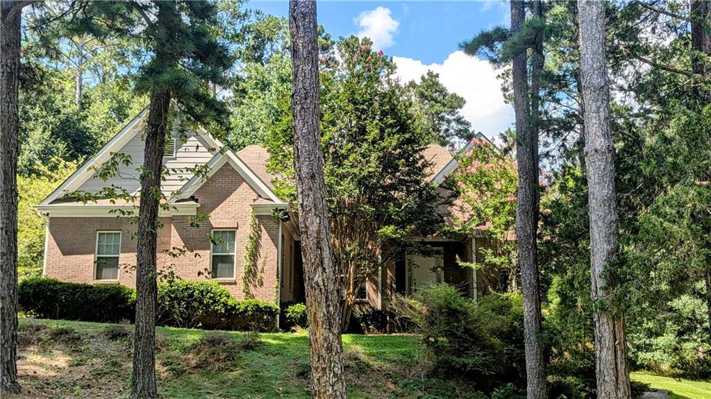 Tucked away on a wooded corner lot, this 3-bedroom, 2.5-bath home features vaulted ceilings in the living room and a cozy fireplace as the focal point. The kitchen overlooks a bright breakfast area, while the spacious master suite boasts tray ceilings, walk-in closets, a double vanity, and a separate tub and shower. Step outside to the back deck, perfect for relaxing or entertaining. A full unfinished basement offers endless potential for added living space or storage.
**Agents: Please read private remarks/look at the offer guidelines in docs before calling, it should answer all questions you have.**