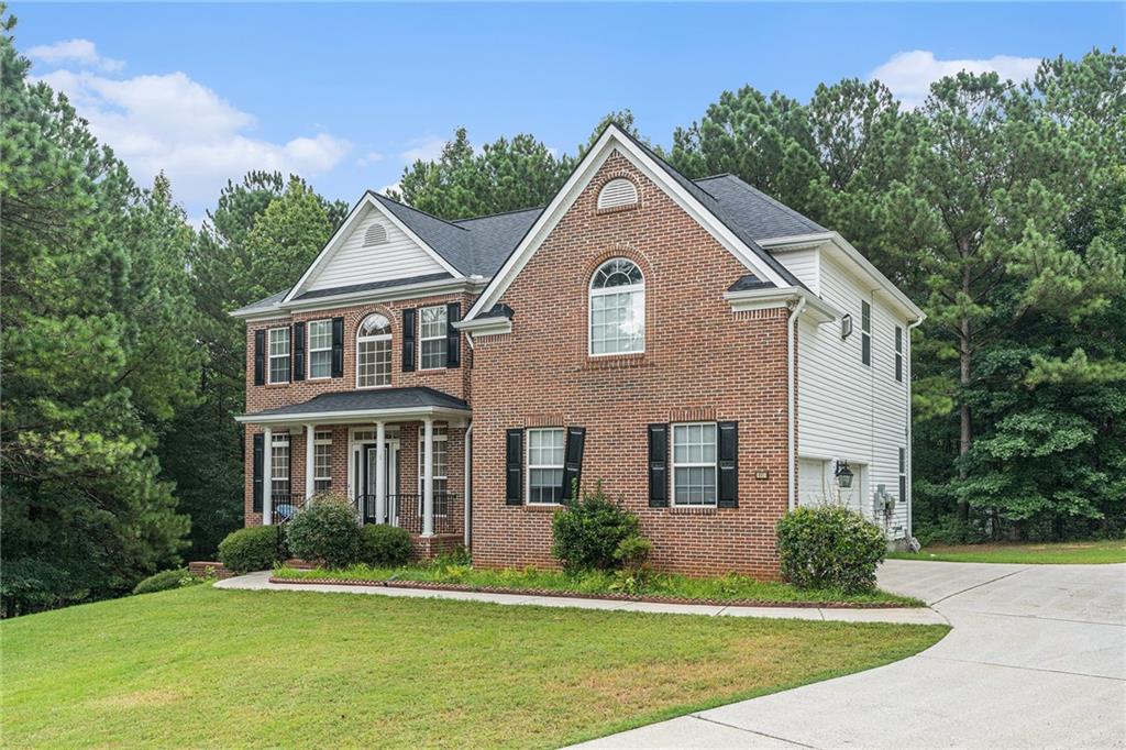 Nestled on a quiet cud-de-sac within the sought after Highland Park subdivision in
Fayetteville, GA, this property offers spacious, executive-style living with
across two levels. The home welcomes you with a dramatic two-story foyer leading to
formal living and dining rooms, and flows into an open kitchen with breakfast bar and
family room featuring a marble fireplace framed by a wall of windows. A convenient
main-floor bedroom and full bath ideal for guests or a home office.
Upstairs, four additional bedrooms include an expansive primary suite boasting a
fireplace, sitting area with palladium window, custom closets, and a spa-style bath. This
well-maintained home showcases hardwoods, tile, and carpeted floors, tray ceilings,
gas logs fireplaces, and a newly installed roof. Outside, enjoy a private, wooded
backyard and patio, perfect for relaxing or entertaining. Built in 2004, this distinguished
property combines elegant design and modern comfort in a prime Fayette County
location.