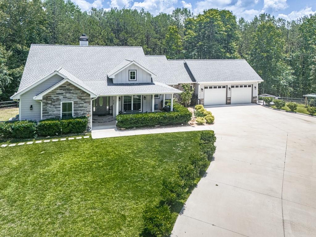 Immaculate 2021 Custom Ranch on 4 Usable Acres in Ellijay, GA – Full Finished Basement, No HOA!
Welcome to this incredibly clean, custom-built 4 bedroom, 3 full bath and (2) 1/2 bath ranch home, completed in 2021 and situated on a stunning and fully usable 4-acre lot in scenic Ellijay, Georgia. Thoughtfully designed and meticulously maintained, this property offers the perfect blend of comfortable main-level living, flexible space, and peaceful privacy.
Some of the Main Level Features include a  Spacious open-concept layout with seamless flow from the living room to the kitchen, Chef’s kitchen with walk-in pantry, ideal for entertaining and everyday living, Oversized master suite with private access to a large sunroom overlooking the backyard, Two generously sized secondary bedrooms and a convenient half bath for guests, Dedicated office/flex room off the front—easily convertible to a fourth bedroom if desired and 2.5 bathrooms on the main level, with high-end finishes and a bright, airy feel throughout!
The Finished Basement Completed in 2024 was Designed as a complete in-law suite with private entrance!
Full kitchen with walk-in pantry, open-concept dining and living areas, Private master suite with full bathroom, Additional flex room currently used as a gym—perfect for a theater room, playroom, or bonus storage, and a 1/2 bath. Covered patio leads to fenced backyard area, ideal for pets or play
Some of the addional features include a 2-car attached garage plus a 3rd garage/workshop at the rear. Separate outbuilding with lean-to added in 2023—great for tools, toys, or hobby space. A Generac whole-home generator (2023) was installed for peace of mind and the well is 650’+ deep with purification system ensures excellent water quality and pressure. Approx. 850’ of fencing (installed 2024) enclosing 1 acre with gated entry—ideal for pets or children. Gently rolling, green and usable land with beautiful natural flow and privacy! There is also an Additional parcel across the private road offers space for a future build, detached garage, or RV storage. No HOA & No Restrictions—bring your RV, boat, or create a hobby farm!
   Â
LOCATION LOCATION LOCATION! Minutes to Downtown Ellijay, 1 minute from Engelheim Vineyards, and just 5 miles to Hwy 515 for easy access to all of North Georgia! Home may be available fully furnished for a true turnkey purchase—whether you're buying for personal use or as an income-producing Airbnb.
This home is the total package: space, flexibility, and location—all wrapped in pristine condition. Don’t miss this rare opportunity to own a one-of-a-kind property in one of North Georgia’s most desirable areas. Schedule your showing today!