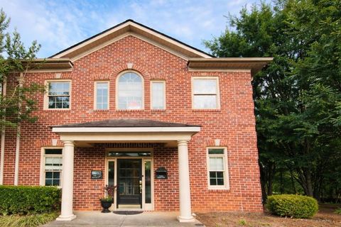 Photo of 5460 Mcginnis Village Place #104, Alpharetta, GA 30005 (MLS # 7741078)
