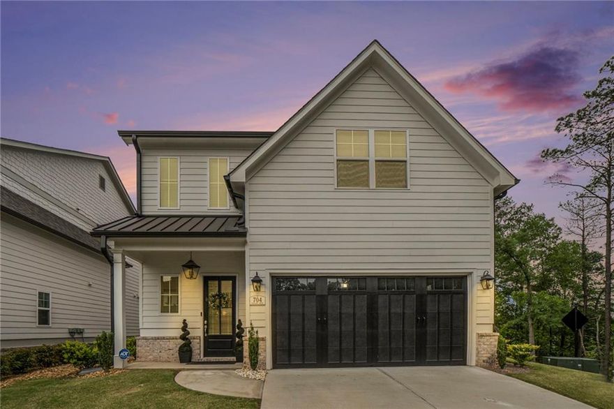 Gorgeous executive home. Pristine and shows like a model home. Just minutes to The Marietta Square with great restaurants, entertainment and festivals.  Bright white kitchen with quartz countertops, stainless steel appliances, gas cooking, upgraded tile backsplash, built-in microwave, recessed lighting, Island and breakfast bar. Large great room with marble gas log fireplace, built-in shelving and French doors that lead to the private backyard. An open concept dining room can seat up to 10. Spacious master bedroom on the main with double tray ceiling and private bathroom featuring granite double vanity countertops, tiled flooring, oversized upgraded tile shower and walk-in closet. Large secondary bedrooms with great closet space. Spacious loft area that works great for a home office. Upgraded hardwood flooring on both upstairs and downstairs. Ten-foot ceilings on the main level and nine-foot ceilings on the second level. Professionally landscaped yard.  The hoa takes care of the lawn maintenance. Peaceful, private fenced in backyard with covered patio perfect for a cooking out. Sq. feet is 2,550. This neighborhood is next to the Marietta City Gold course.  Great location to the Marietta Square, great shopping, restaurants, entertainment, I-75, 285 and the Airport.