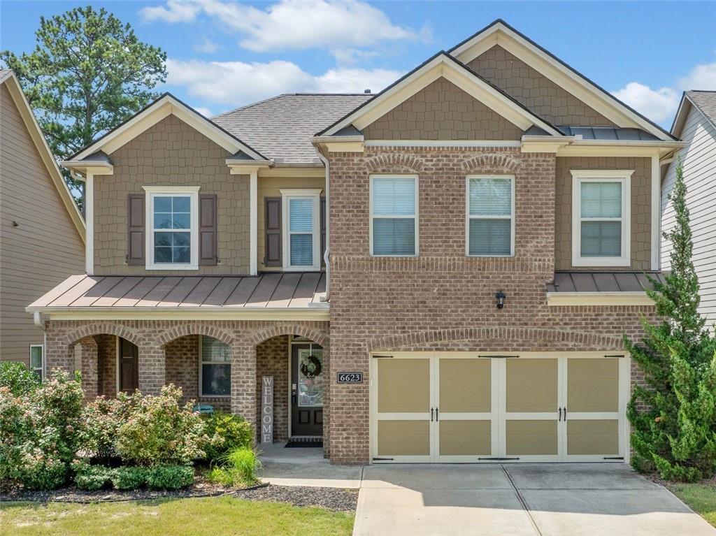 Welcome to 6223 Rivergreen Road, a stunning home located in Sterling on the Lake. The seller is offering $5,000 towards closing costs & golf cart. The primary suite on the main level is a retreat, offering an extended sitting area with patio access, a walk-in closet, and a luxurious en-suite with a soaking tub, separate shower, and double vanity. The kitchen is a chef's dream with stainless steel appliances, granite countertops, white cabinets, a tiled backsplash and a gas stove. All under high ceilings. The open-concept main floor features bamboo floors, recessed lighting, a spacious great room with a stacked stone fireplace, and dining area. The second level provides a versatile loft entertainment area, three additional bedrooms, and a shared bathroom with a double sink vanity. Step outside to enjoy the extended covered patio, a concrete walkway and a firepit platform, and a fully fenced backyard. With a two-car garage and main-floor laundry for added convenience, this home is ready to welcome you to a life of comfort and elegance. Sterling on the Lake is a premier swim and tennis community renowned for its resort-style living. From its scenic trails and sparkling lake, clubhouse, 6 pickleball courts, 4 pools, 4 tennis courts, and vibrant social events, this neighborhood offers a lifestyle that feels like a permanent gateway.
