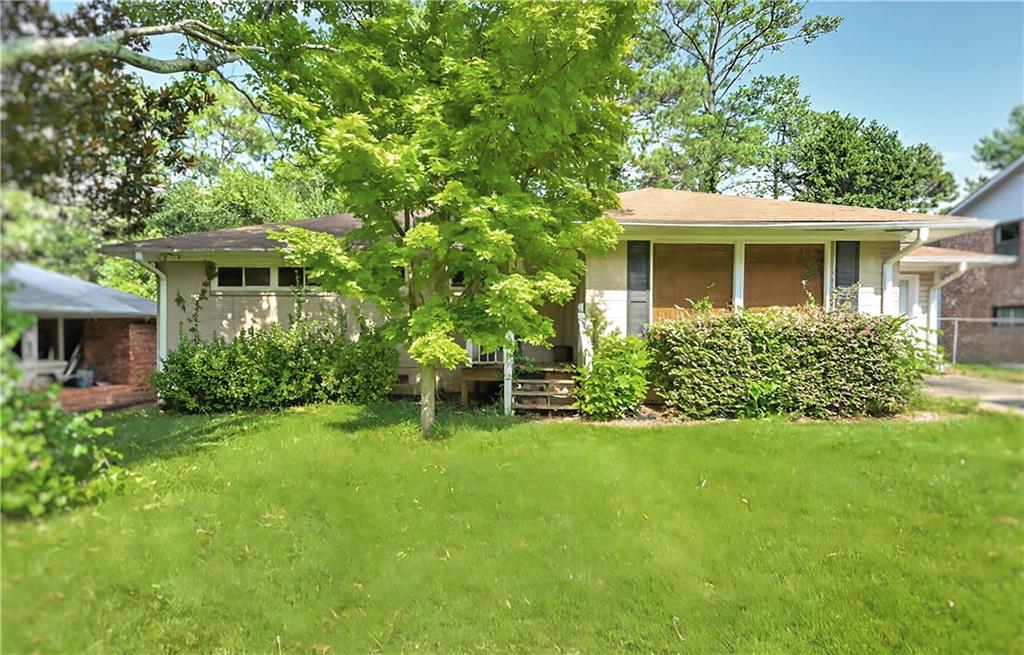 ** WORRIED ABOUT MONTHLY PAYMENT? My preferred lender is **working miracles** SAVING CLIENTS THOUSANDS of dollars per year!
** Ask about DOWN PAYMENT ASSISTANCE available to qualified homebuyers through Preferred Lender!
Welcome to 2735 Spring Dr SE—an unbeatable opportunity in prime Smyrna just minutes from Truist Park, The Battery, and I-75/I-285!
This charming 3-bedroom, 2-bath ranch sits on a flat, private lot in a quiet, established neighborhood.
Inside, you’ll find a spacious layout with real hardwood floors, an open living and dining area, and a granite kitchen ready for your personal touch. The primary suite features an ensuite bath, while two secondary bedrooms share a full hall bath.
Step outside to enjoy a large, fenced backyard and enclosed patio with fireplace—perfect for relaxing or entertaining. Walk to nearby schools, shops, parks, and restaurants.
Whether you’re a first-time buyer, investor, or looking to renovate and build equity, this location checks all the boxes!
IMAGES VIRTUALLY STAGED.
PRICED TO SELL AS IT NEEDS SOME TLC.
MOTIVATED SELLER. ALL REASONABLE OFFERS CONSIDERED.